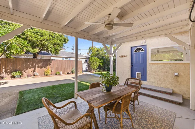 a view of a backyard with a patio