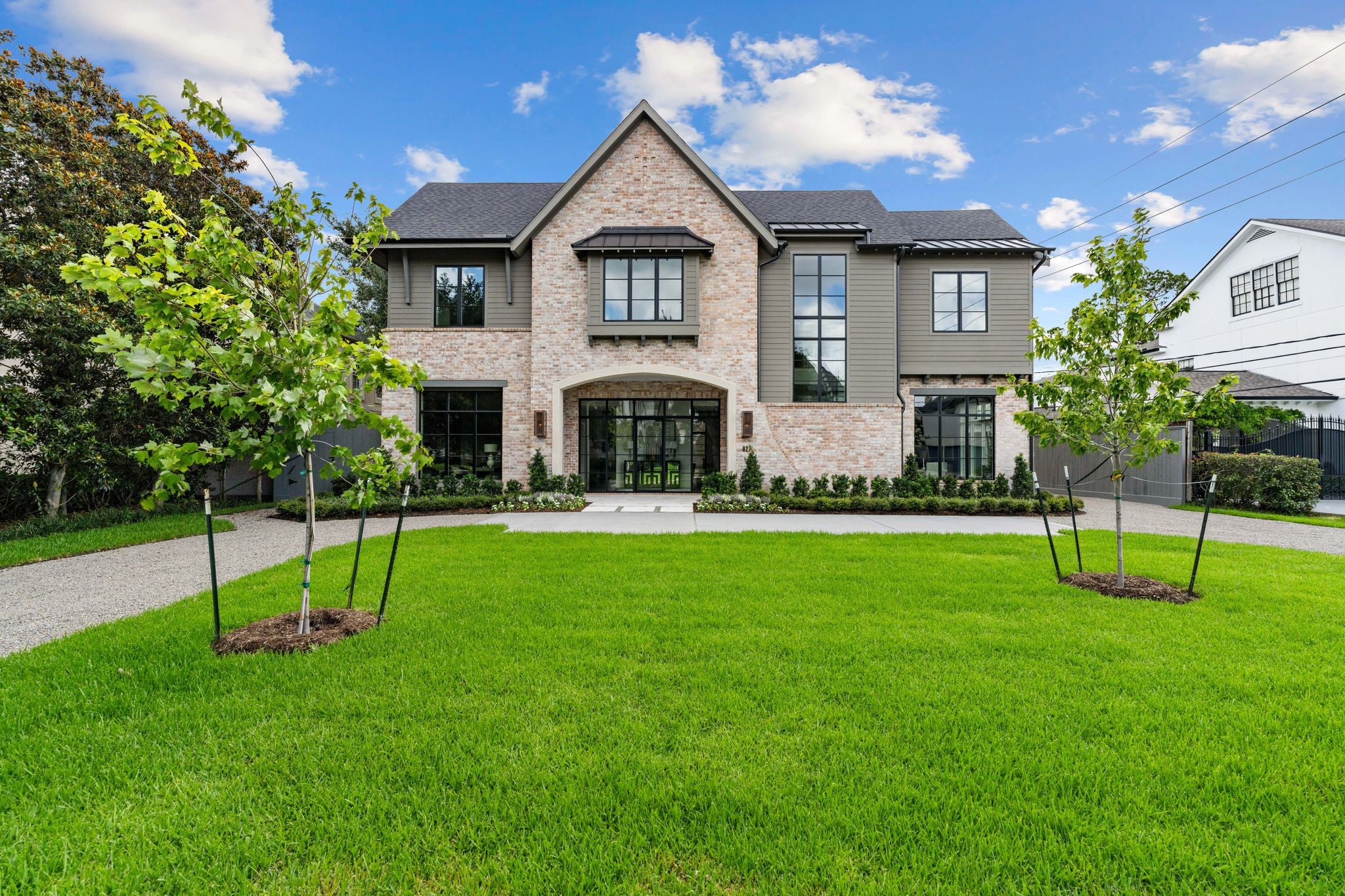 Front Elevation]
This impressive residence was built by Winfrey Design Build with interiors created by award-winning Lucas Eilers Design Associates. Outstanding features include Pella Lifestyle windows and Pella Reserve Series doors.