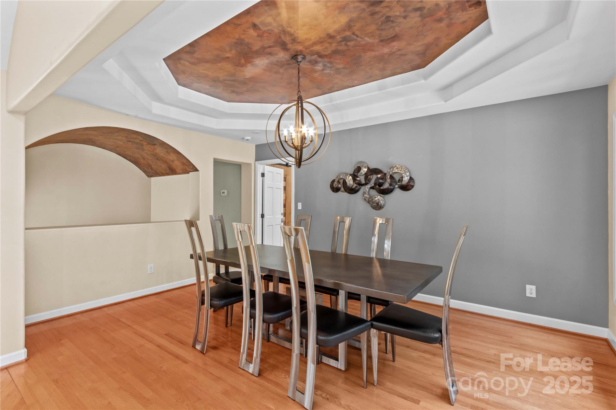 709 Normandy Road Mooresville, NC 28117 - Photo 11 of 46 a view of a dining room with furniture and wooden floor