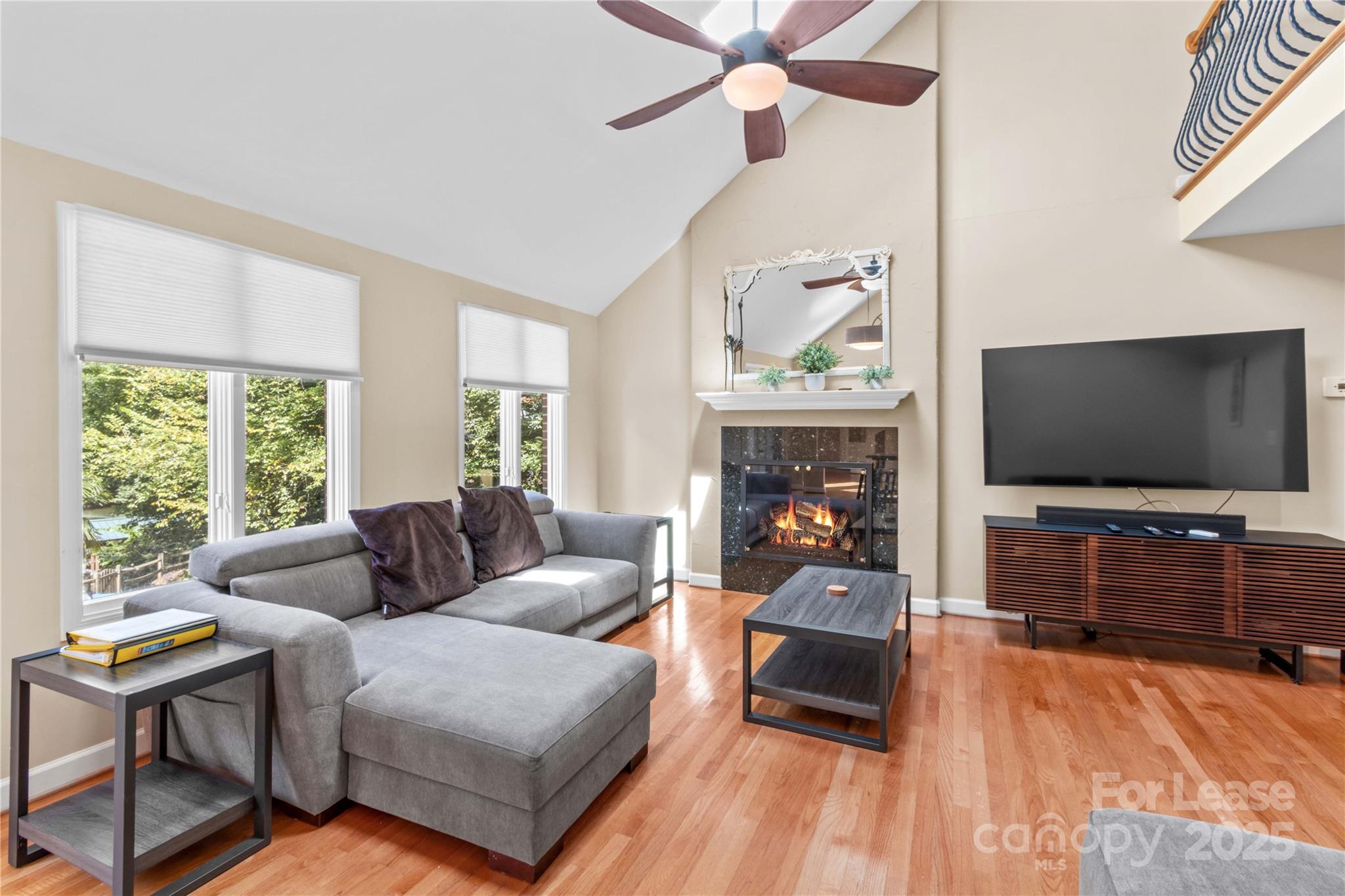 709 Normandy Road Mooresville, NC 28117 - Photo 14 of 46 a living room with furniture and a flat screen tv