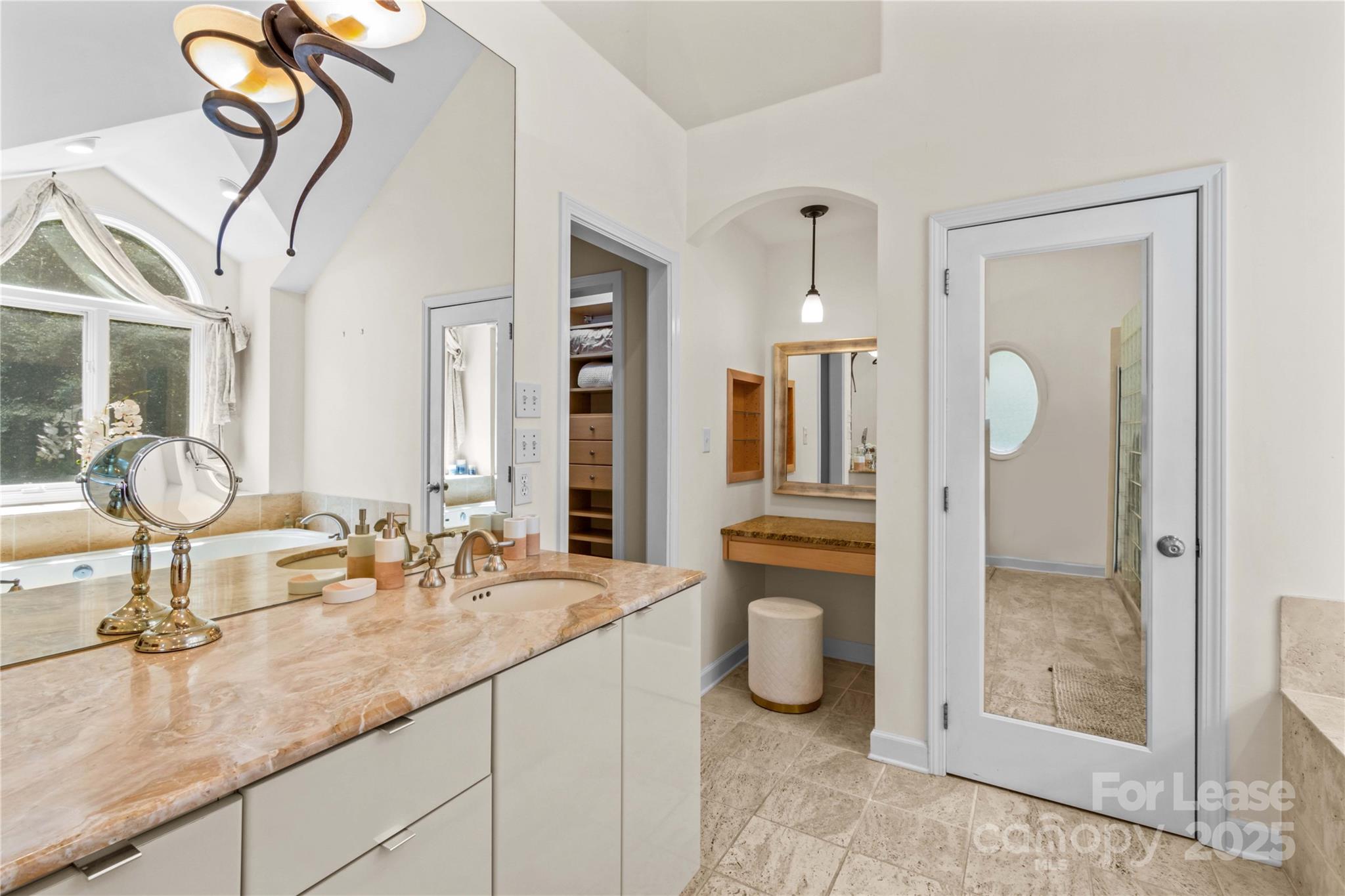 709 Normandy Road Mooresville, NC 28117 - Photo 22 of 46 a bathroom with a granite countertop sink mirror and vanity