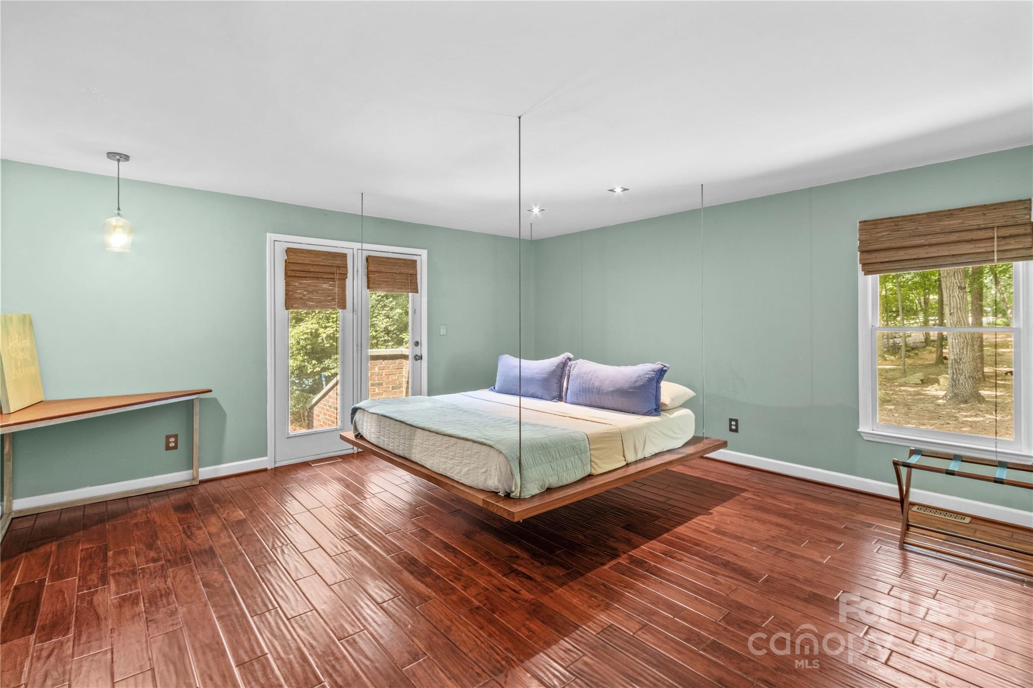 709 Normandy Road Mooresville, NC 28117 - Photo 25 of 46 a bedroom with a bed and a window