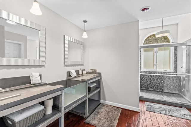 a view of gallery with wooden floor