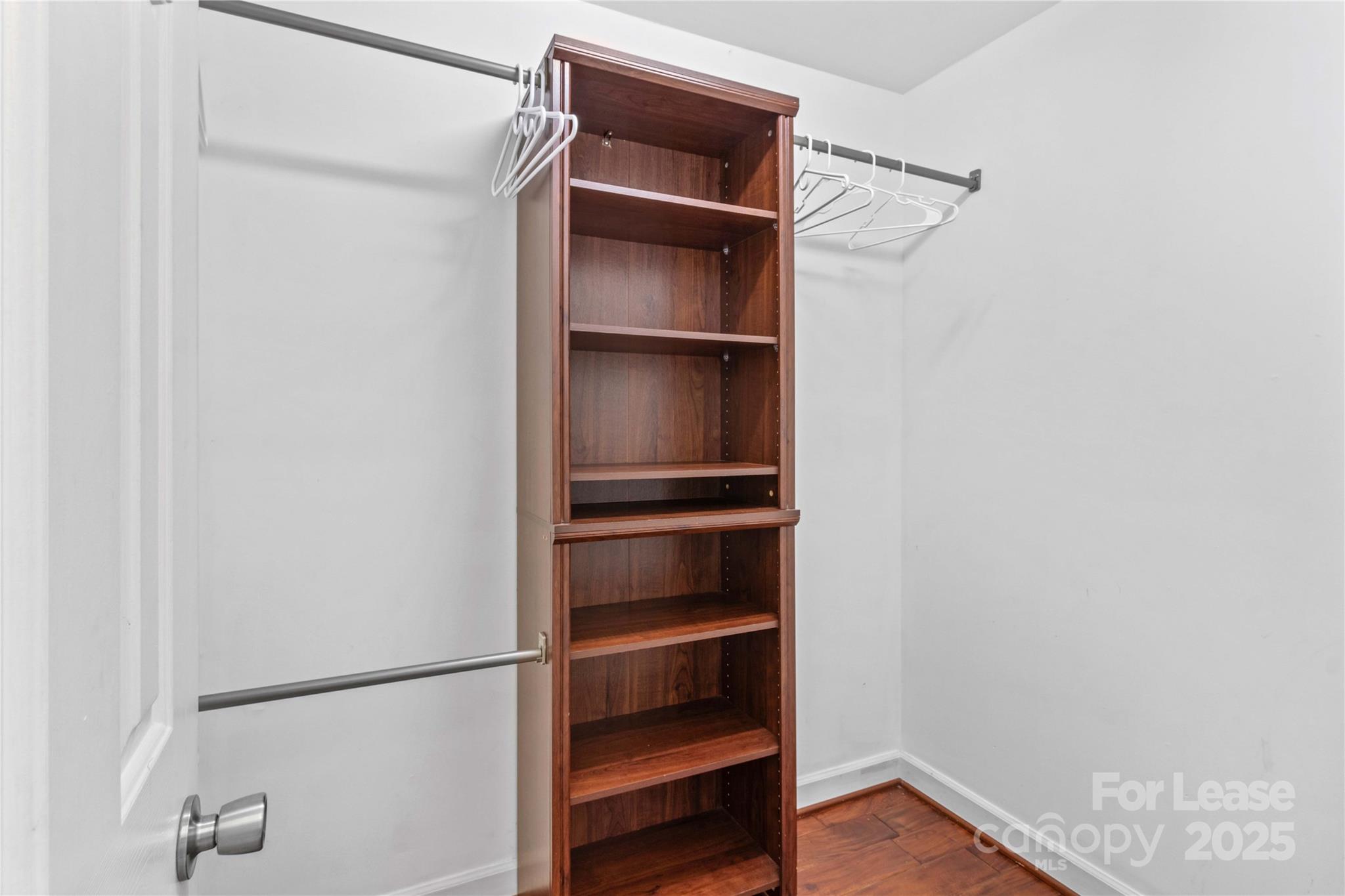 709 Normandy Road Mooresville, NC 28117 - Photo 31 of 46 a view of walk in closet with empty racks