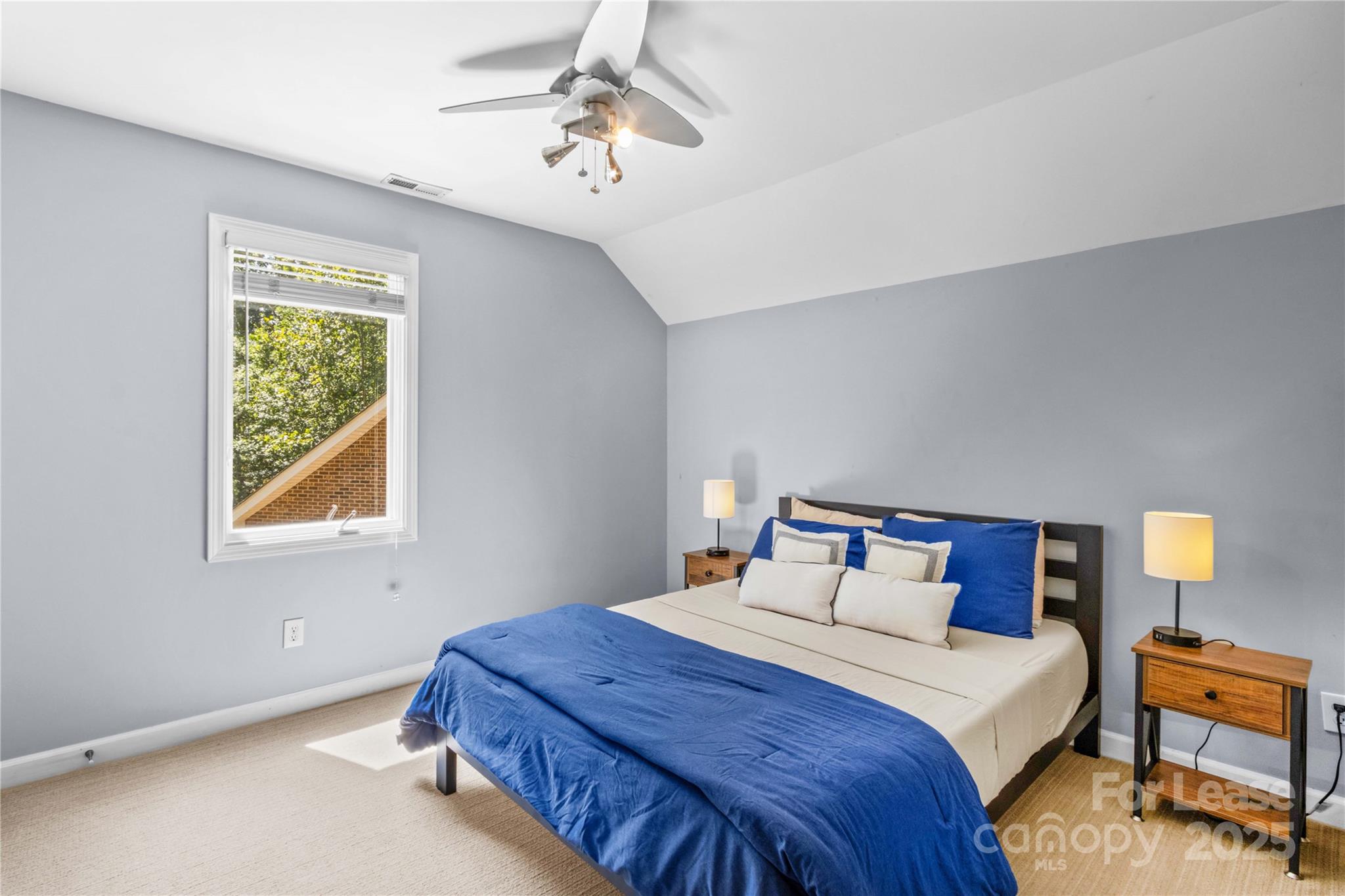 709 Normandy Road Mooresville, NC 28117 - Photo 34 of 46 a bedroom with a bed and window