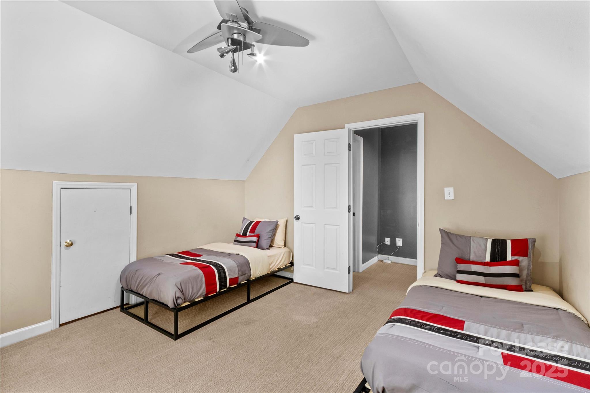 709 Normandy Road Mooresville, NC 28117 - Photo 39 of 46 a bedroom with bed and a chandelier