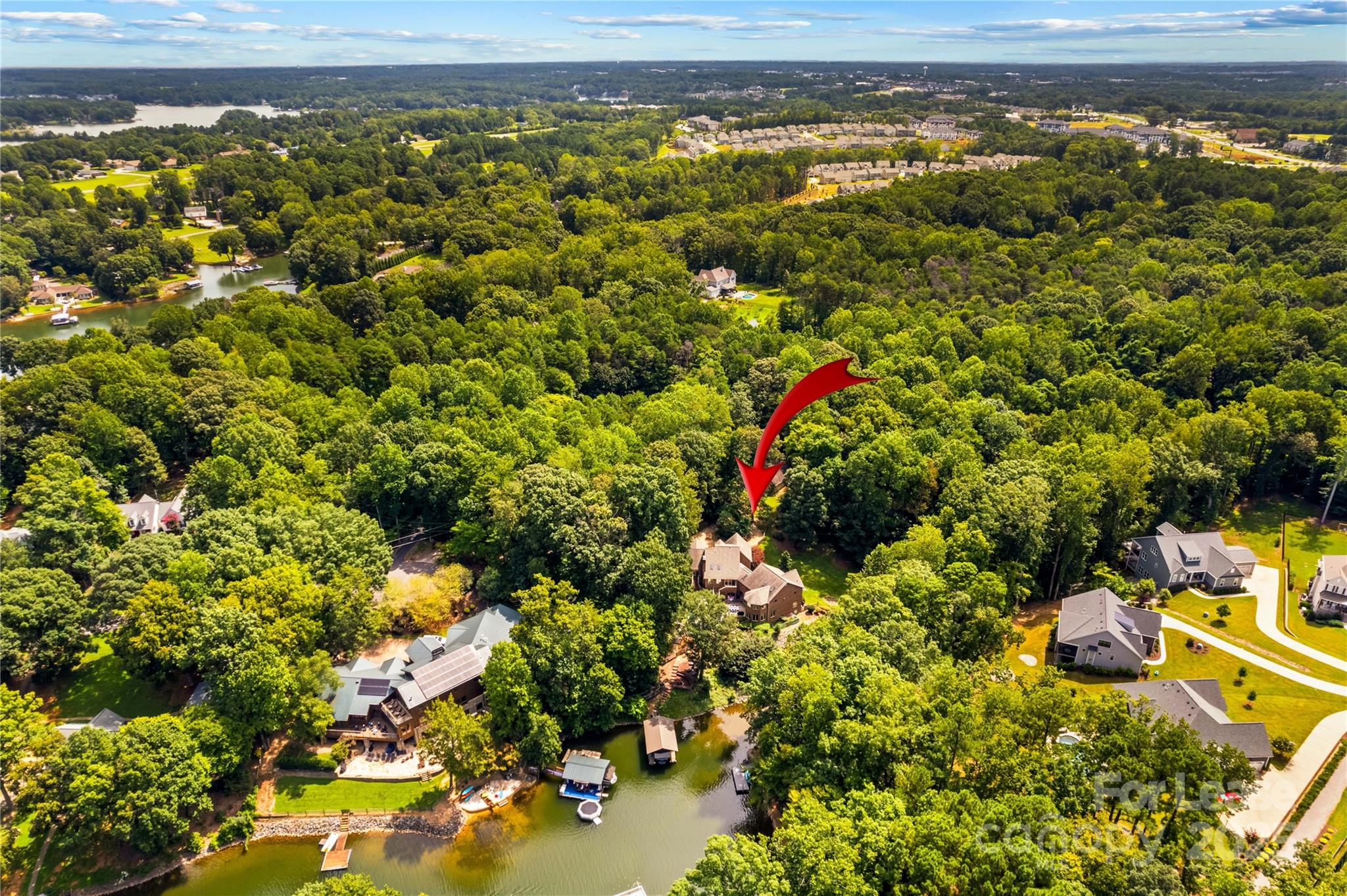 709 Normandy Road Mooresville, NC 28117 - Photo 4 of 46 a view of a lake with sitting space