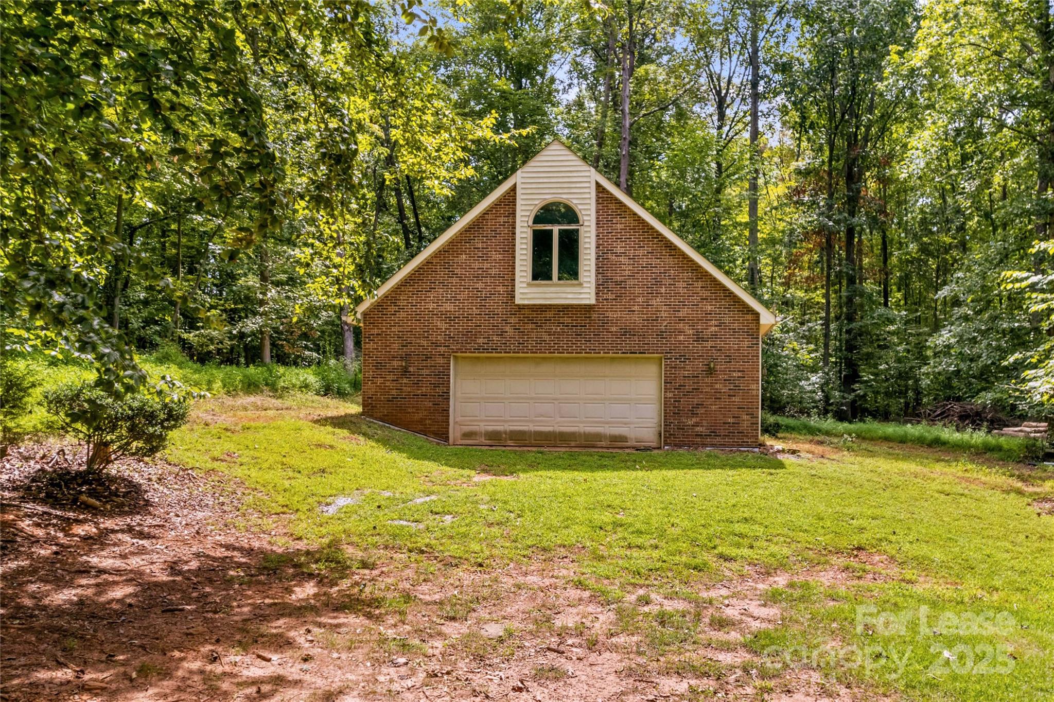 709 Normandy Road Mooresville, NC 28117 - Photo 42 of 46 a view of a yard in front of a house with large trees