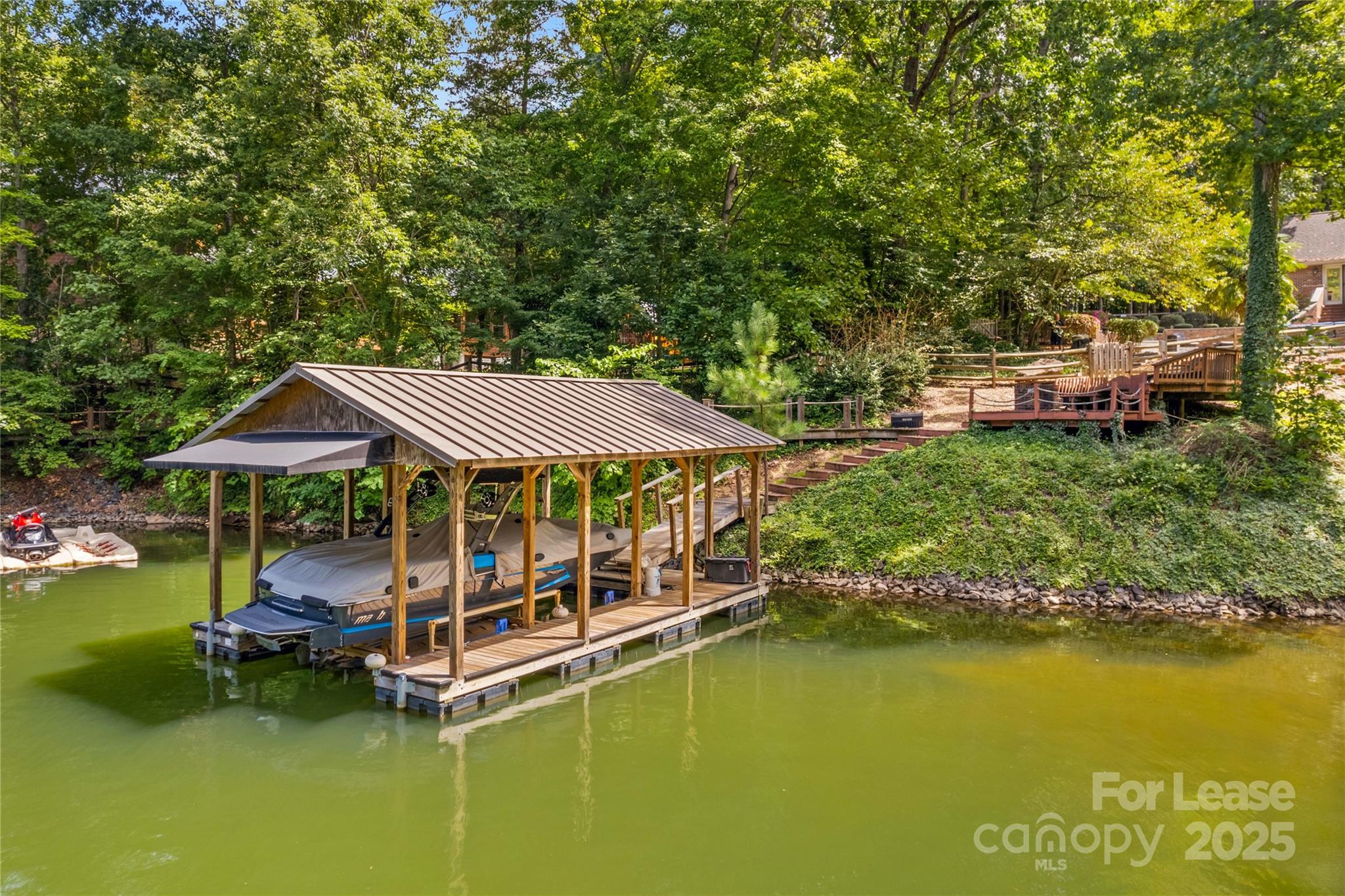 709 Normandy Road Mooresville, NC 28117 - Photo 44 of 46 a view of a swimming pool and lounge chair