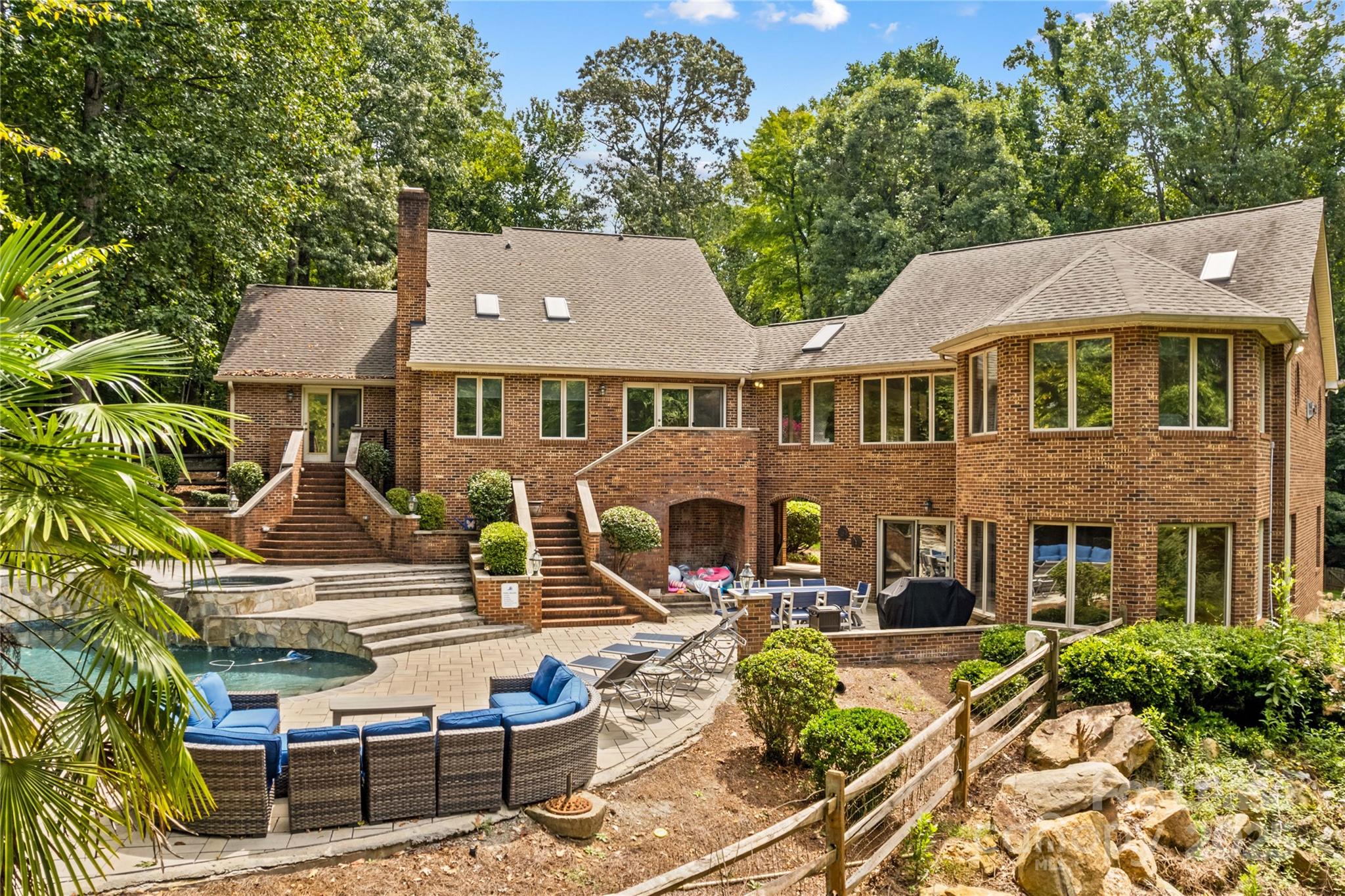 709 Normandy Road Mooresville, NC 28117 - Photo 9 of 46 a front view of a house with garden