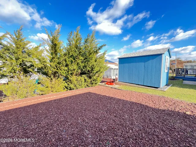 a view of a back yard of the house