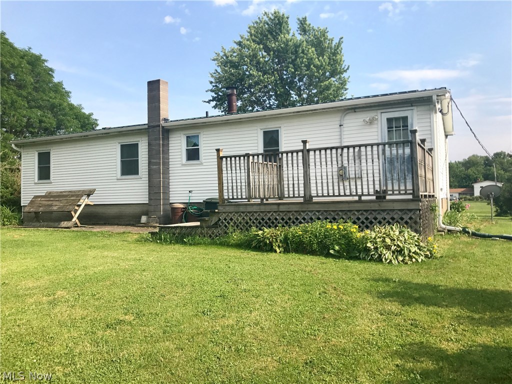 15540 Valentine Road Thompson, OH 44086 - Photo 16 of 18 Back deck to enjoy the privacy of your large back yard