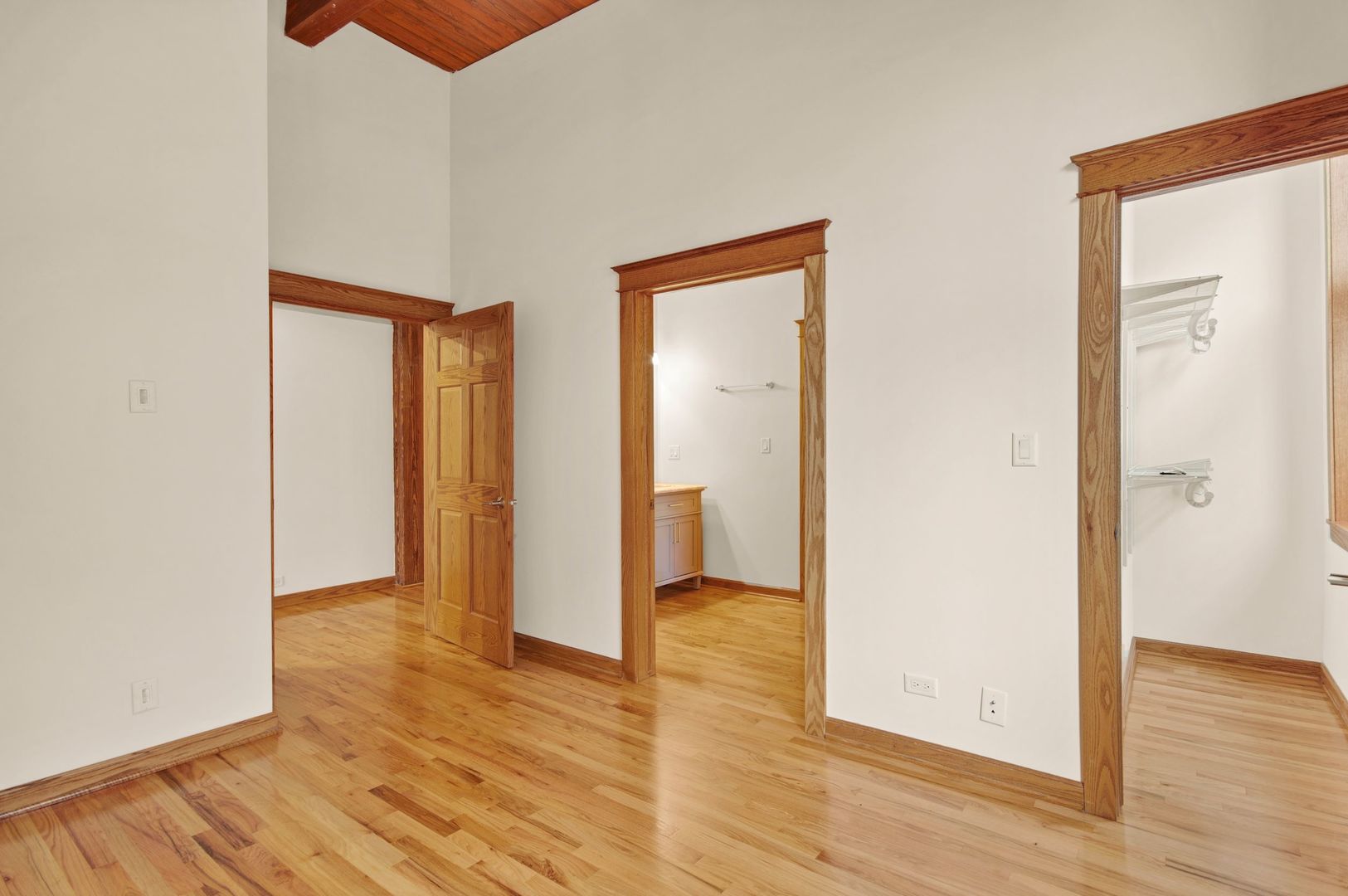 216 North May Street, Unit 403 Chicago, IL 60607 - Photo 6 of 18 a view of hallway with wooden floor