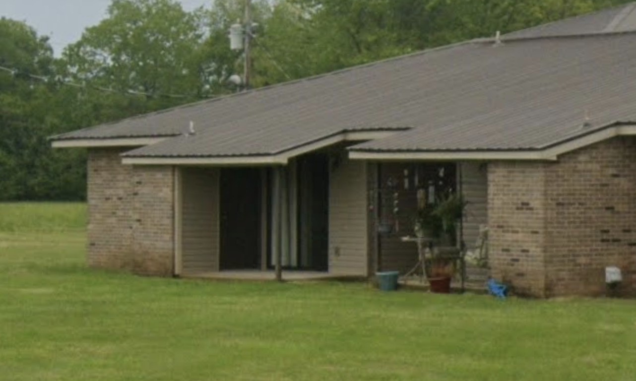 25600 Smithfield Road Other, AL 35620 - Photo 2 of 6 front view of a house with a yard