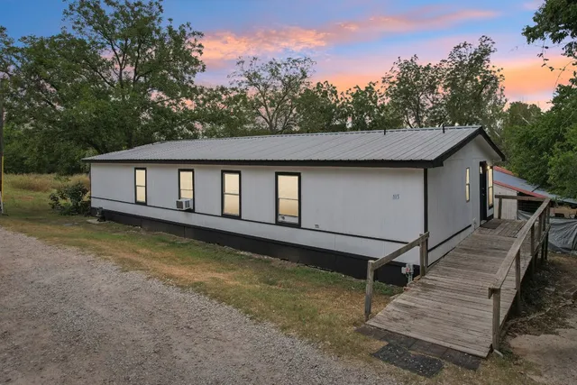 a house view with a garden space