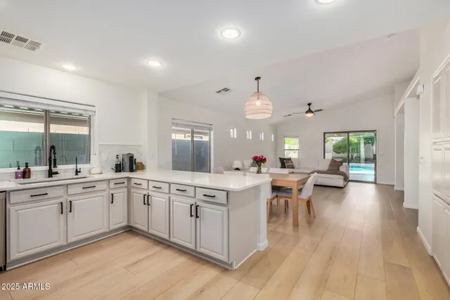 a view of a kitchen and dining room