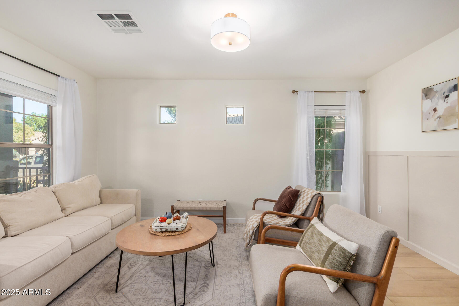 3433 East Hopkins Road Gilbert, AZ 85295 - Photo 13 of 38 a living room with furniture and a potted plant