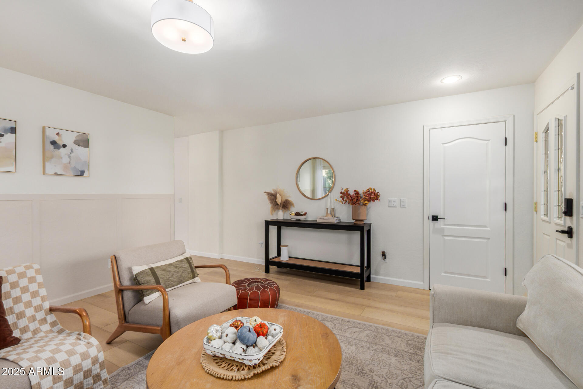 3433 East Hopkins Road Gilbert, AZ 85295 - Photo 14 of 38 a living room with furniture and a table