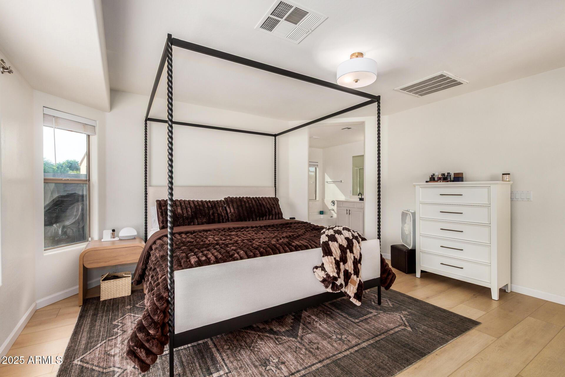 3433 East Hopkins Road Gilbert, AZ 85295 - Photo 22 of 38 a bedroom with a bed and a window