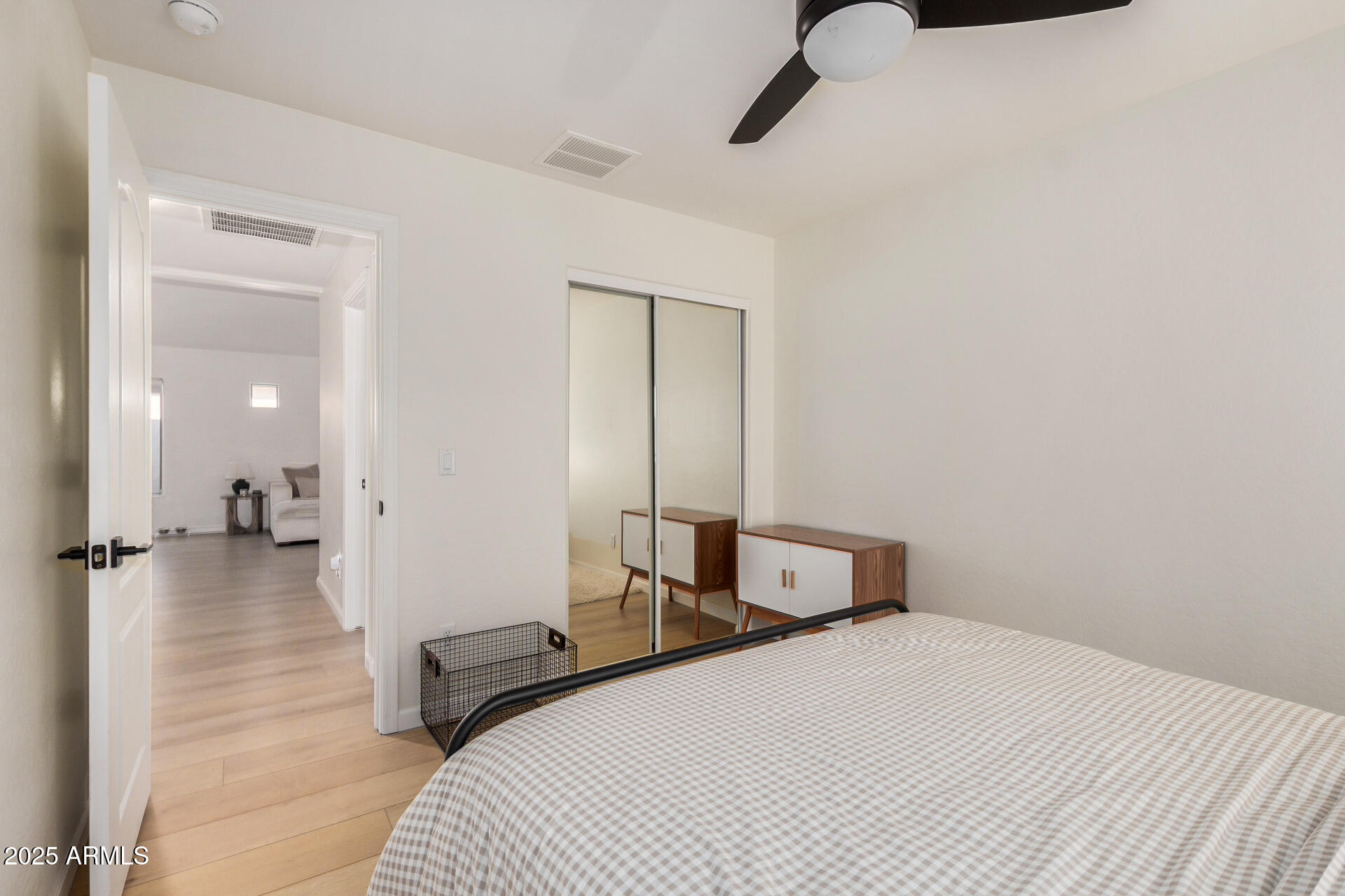 3433 East Hopkins Road Gilbert, AZ 85295 - Photo 30 of 38 a bedroom with a bed and a large mirror