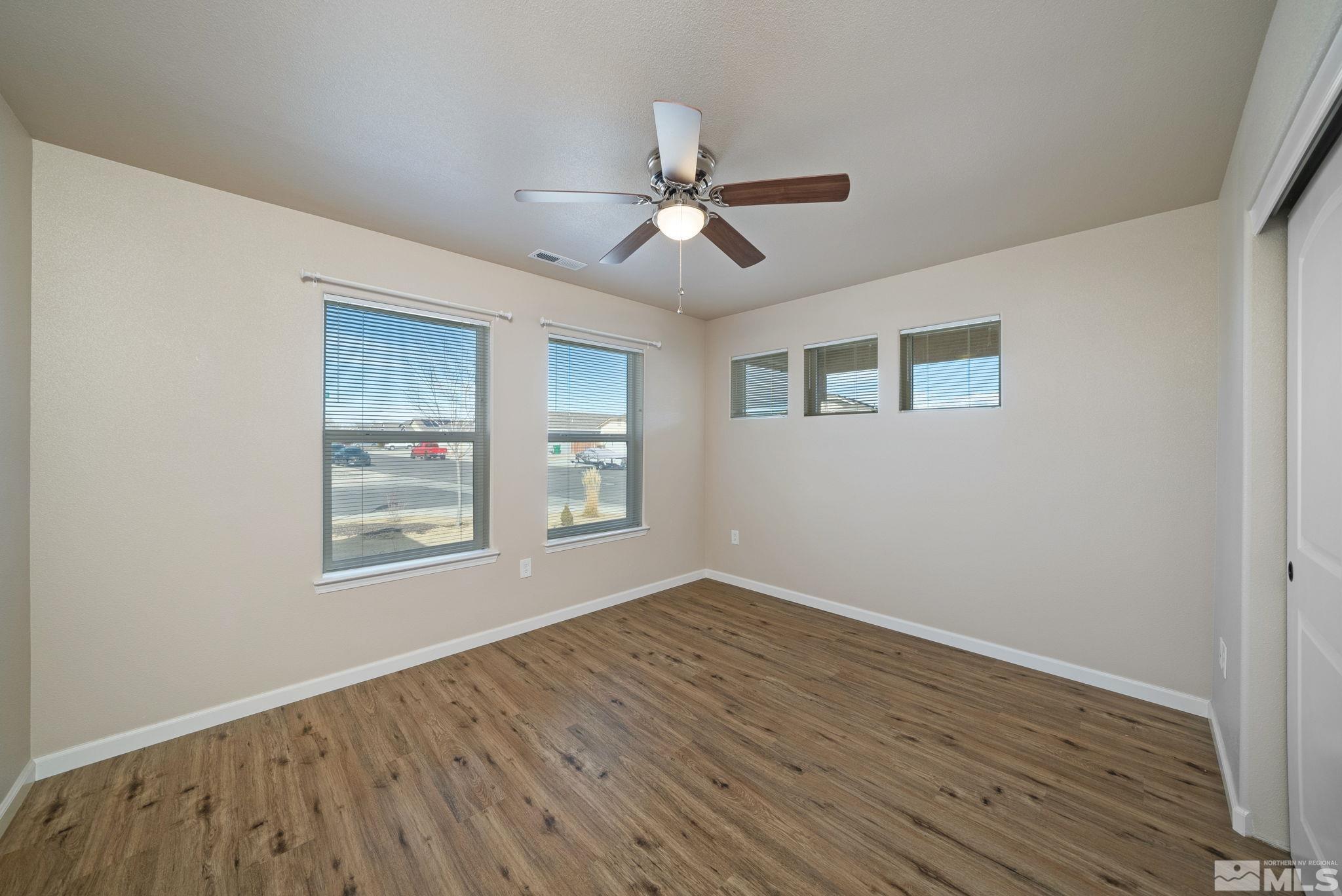 2513 Ladera Fallon, NV 89406 - Photo 20 of 30 a view of empty room with wooden floor and fan