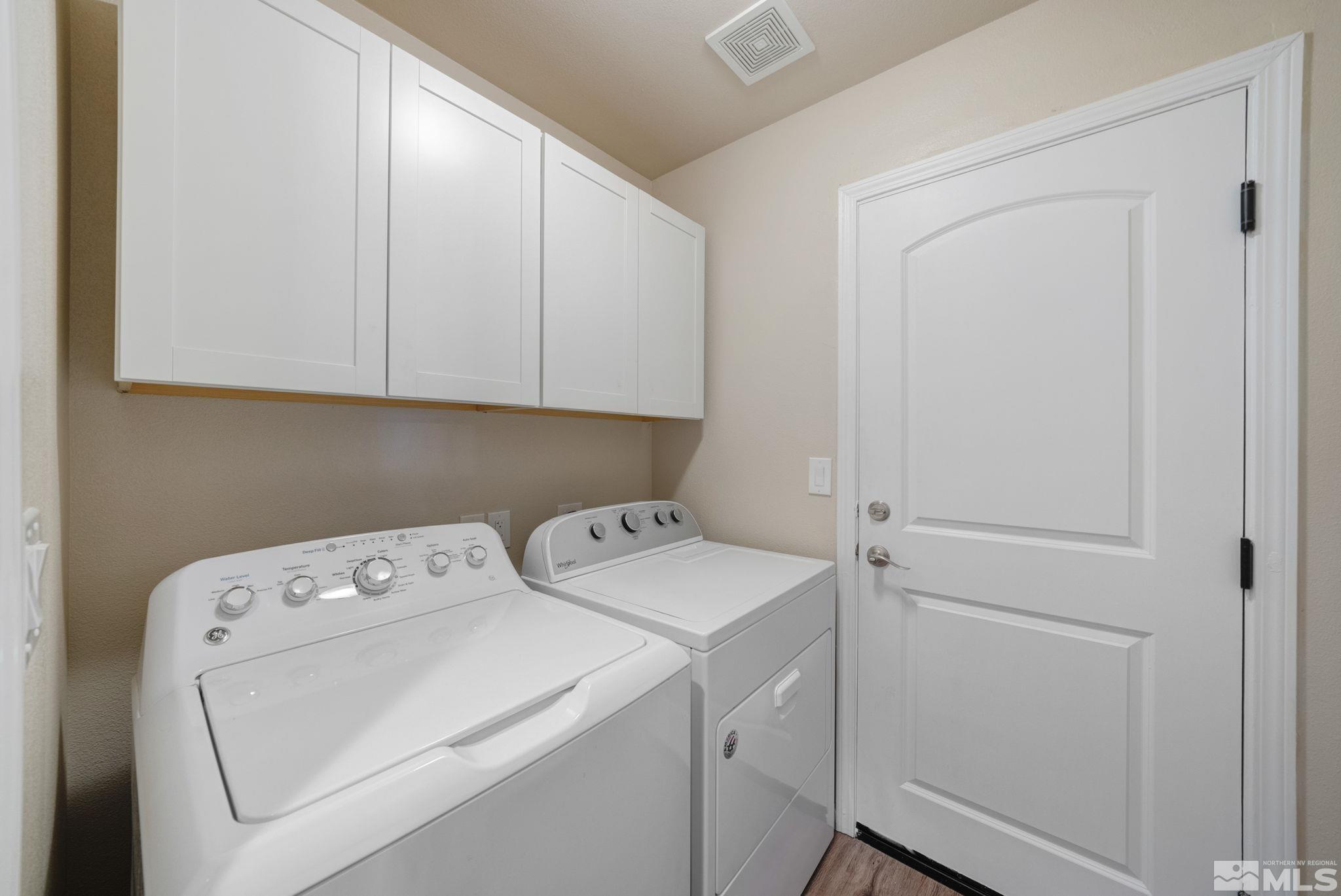 2513 Ladera Fallon, NV 89406 - Photo 22 of 30 a view of storage and utility room with washer and dryer