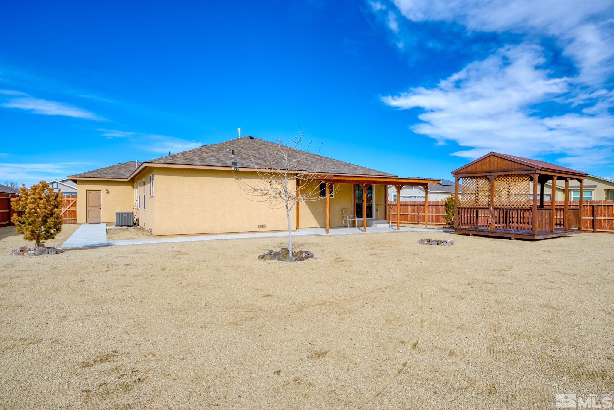 2513 Ladera Fallon, NV 89406 - Photo 27 of 30 a front view of a house with a yard