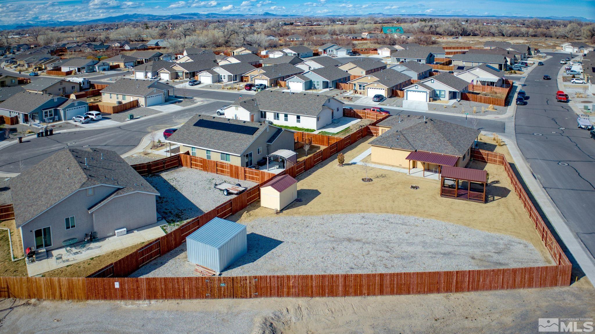 2513 Ladera Fallon, NV 89406 - Photo 4 of 30 an aerial view of a house with a swimming pool