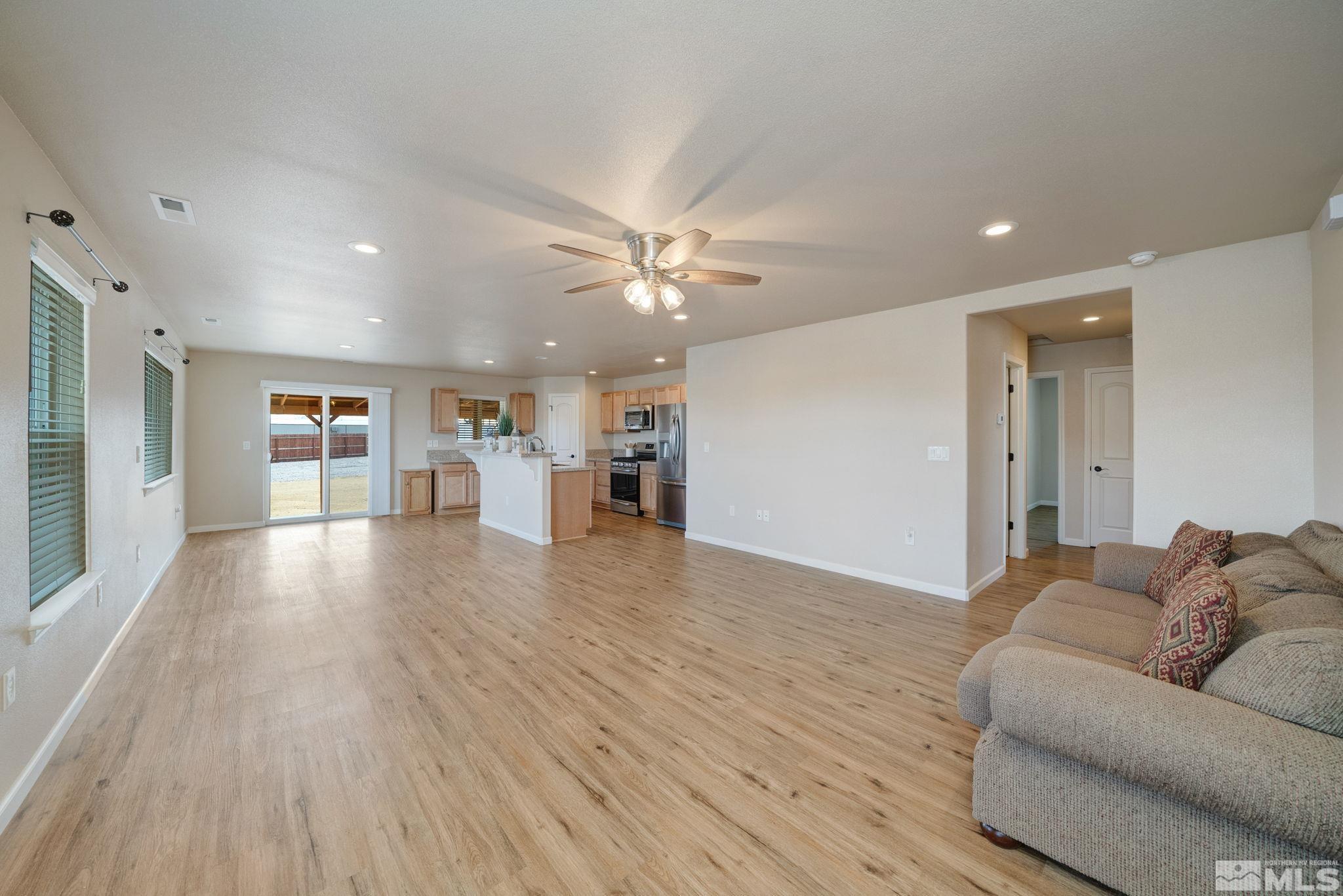2513 Ladera Fallon, NV 89406 - Photo 8 of 30 a living room with furniture and wooden floor