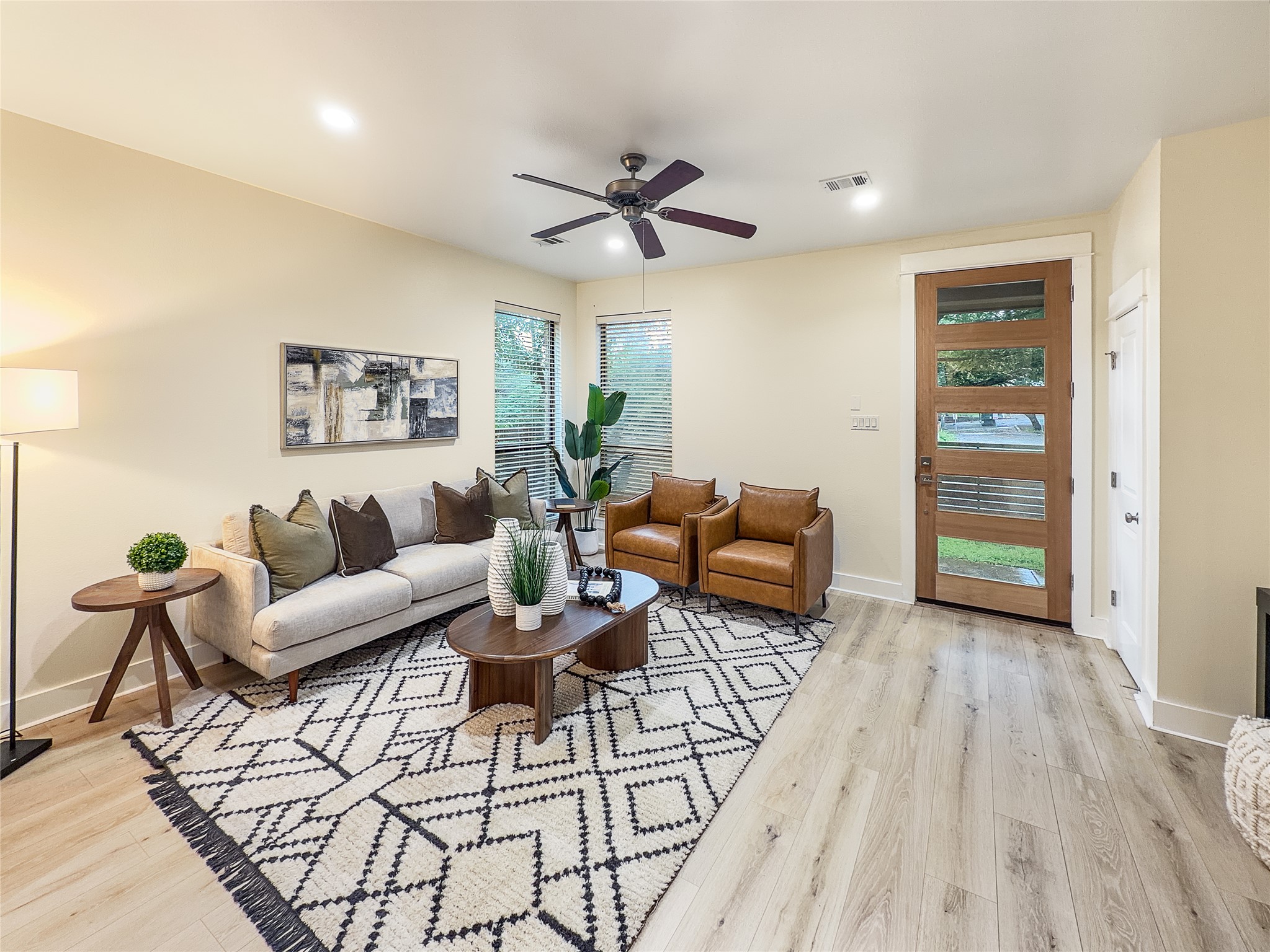 4120 Valley View Road, Unit B Austin, TX 78704 - Photo 4 of 17 Natural light illuminates this inviting living space featuring durable flooring and recessed lighting.