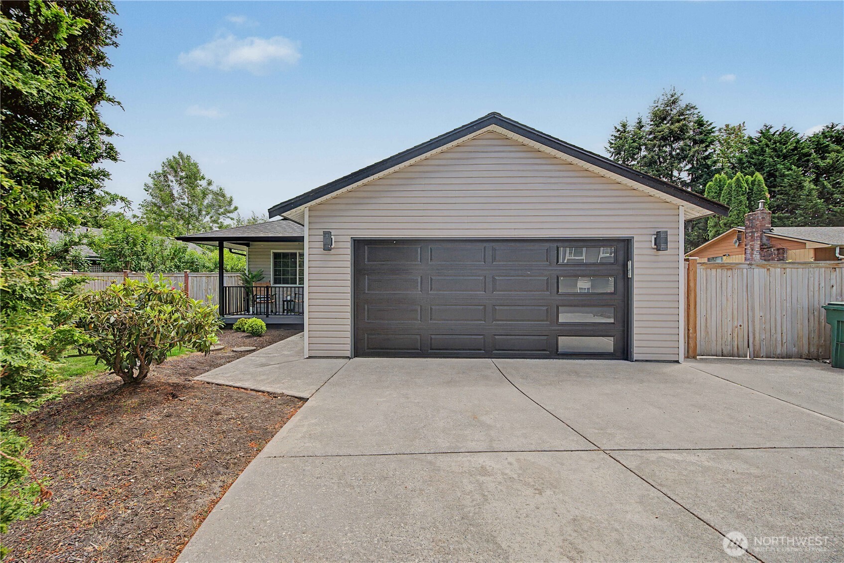 20919 Ronning Road Arlington, WA 98223 - Photo 2 of 28 a front view of house with yard and trees around