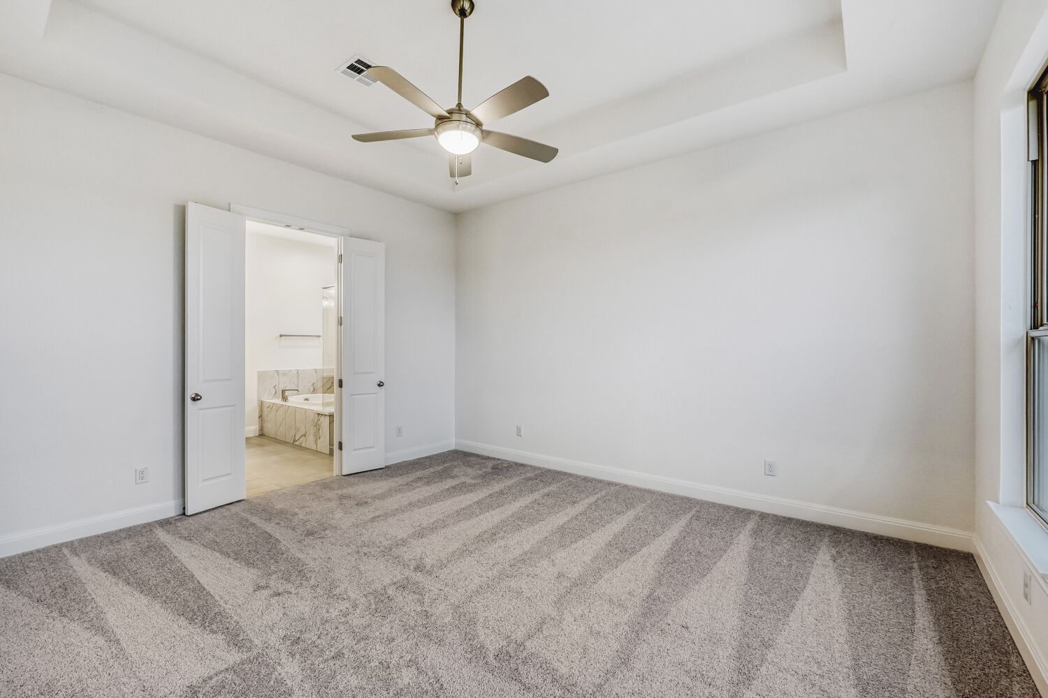 222 Prickly Poppy Loop Kyle, TX 78640 - Photo 5 of 11 an empty room with a view of a livingroom