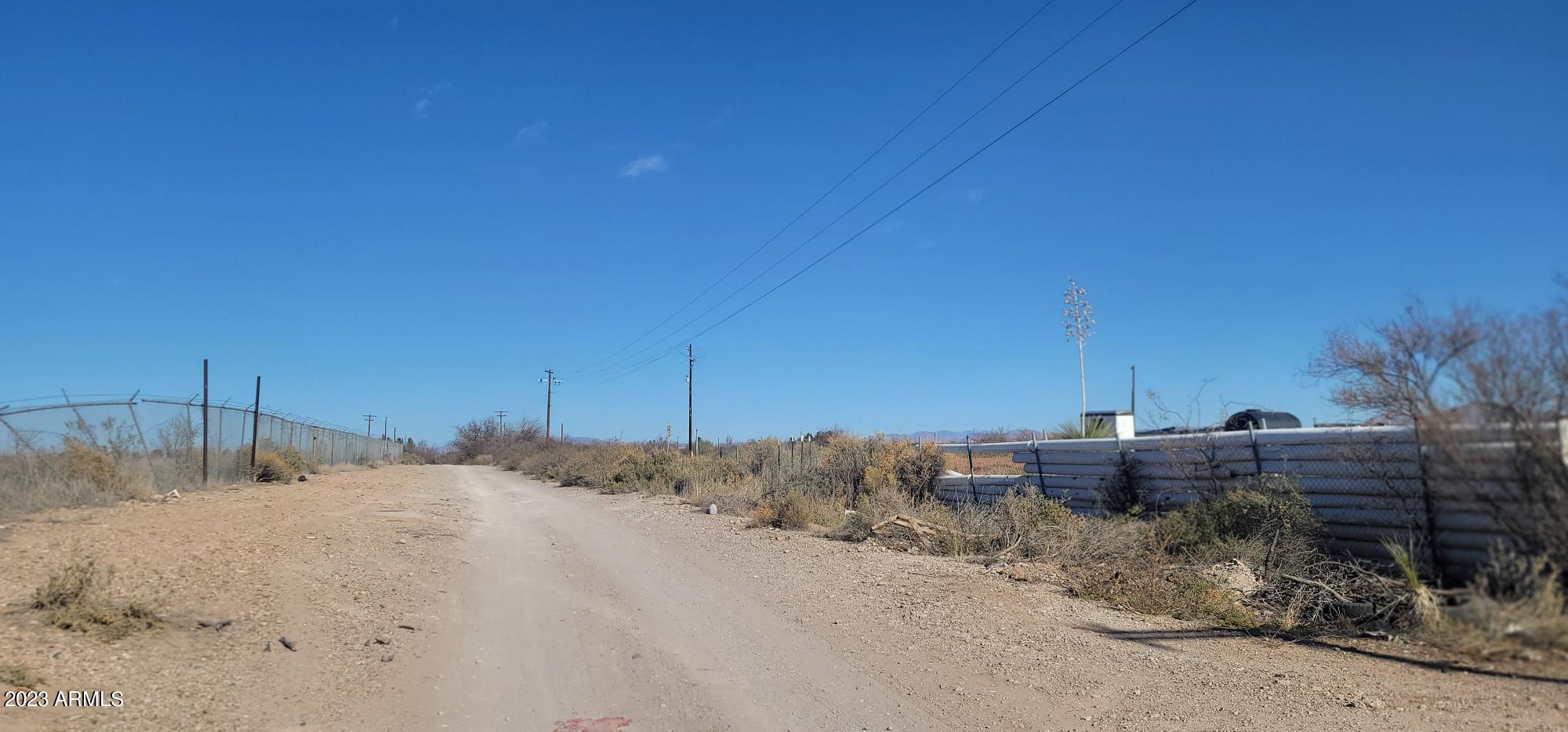 Xxxx 11th Street Douglas, AZ 85607 - Photo 5 of 8 a view of a dry yard with a tree