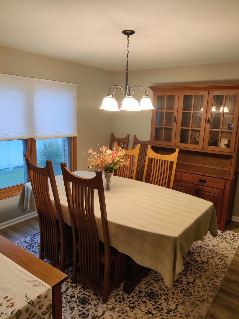 1681 Boulder Ridge Drive Bolingbrook, IL 60490 - Photo 12 of 17 a view of a dining room with furniture