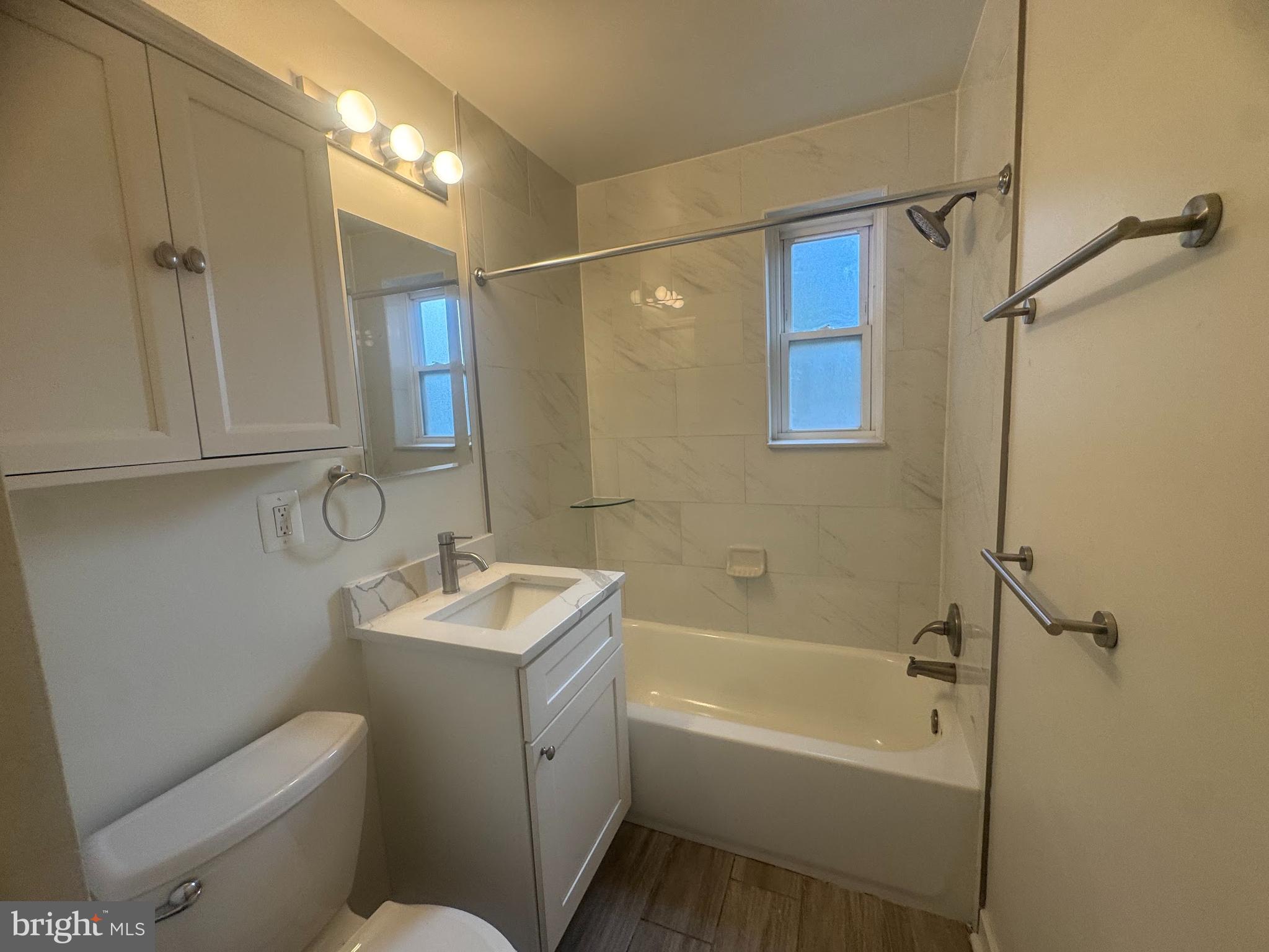500 South Courthouse Road, Unit 9 Arlington, VA 22204 - Photo 16 of 18 a bathroom with a sink toilet and shower