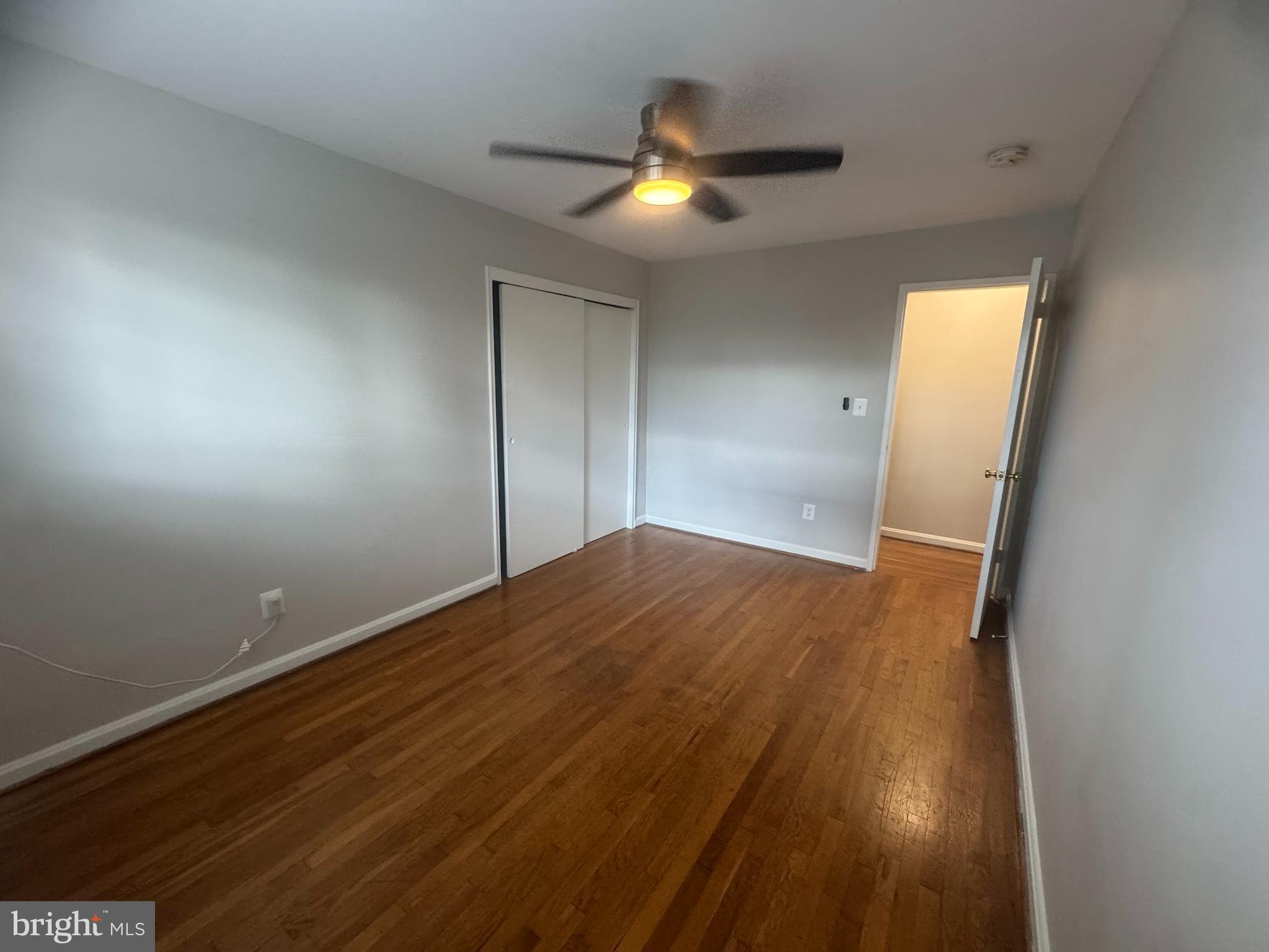 500 South Courthouse Road, Unit 9 Arlington, VA 22204 - Photo 17 of 18 a view of empty room with wooden floor