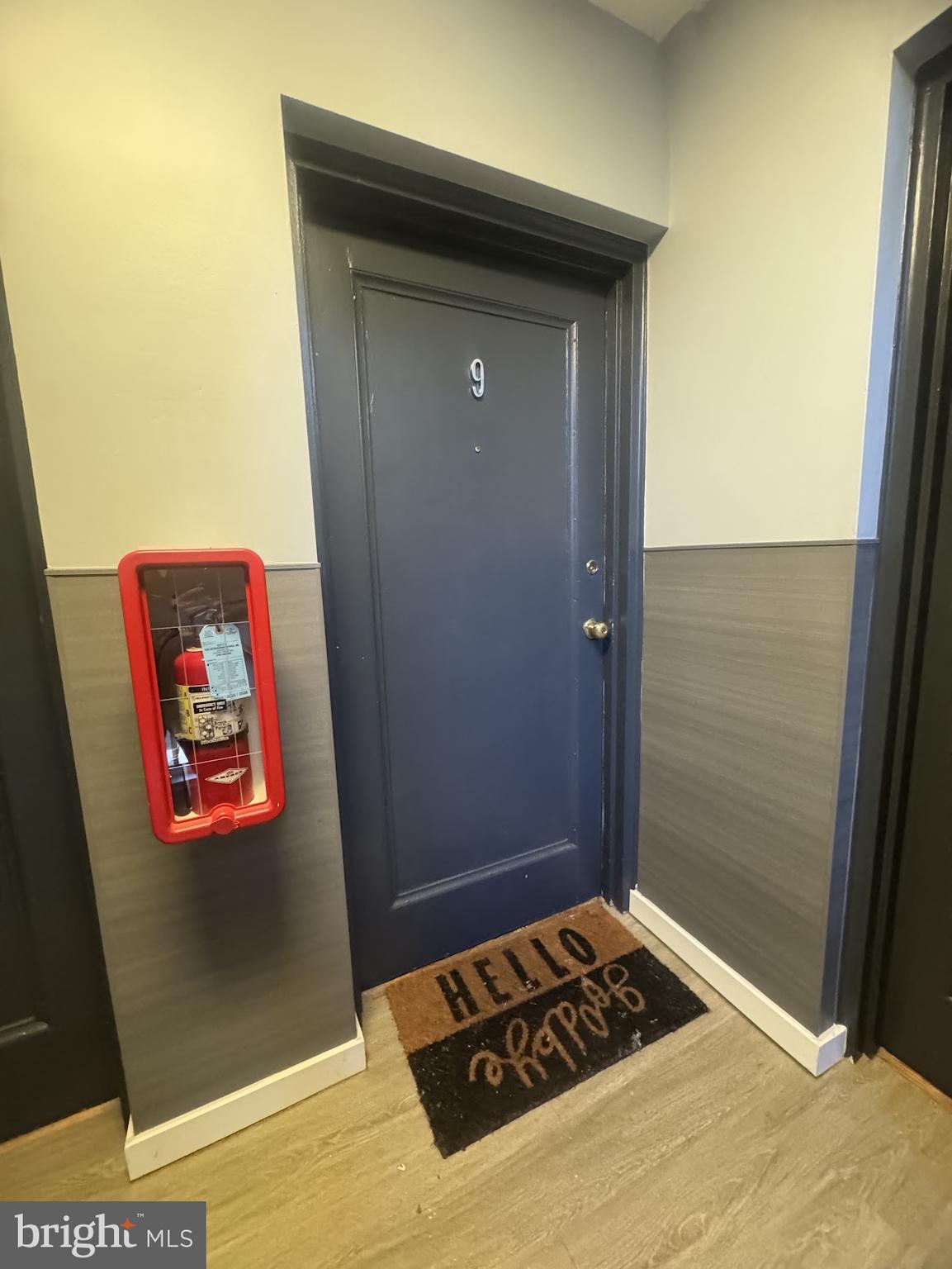 500 South Courthouse Road, Unit 9 Arlington, VA 22204 - Photo 3 of 18 a view of a hallway with wooden floor