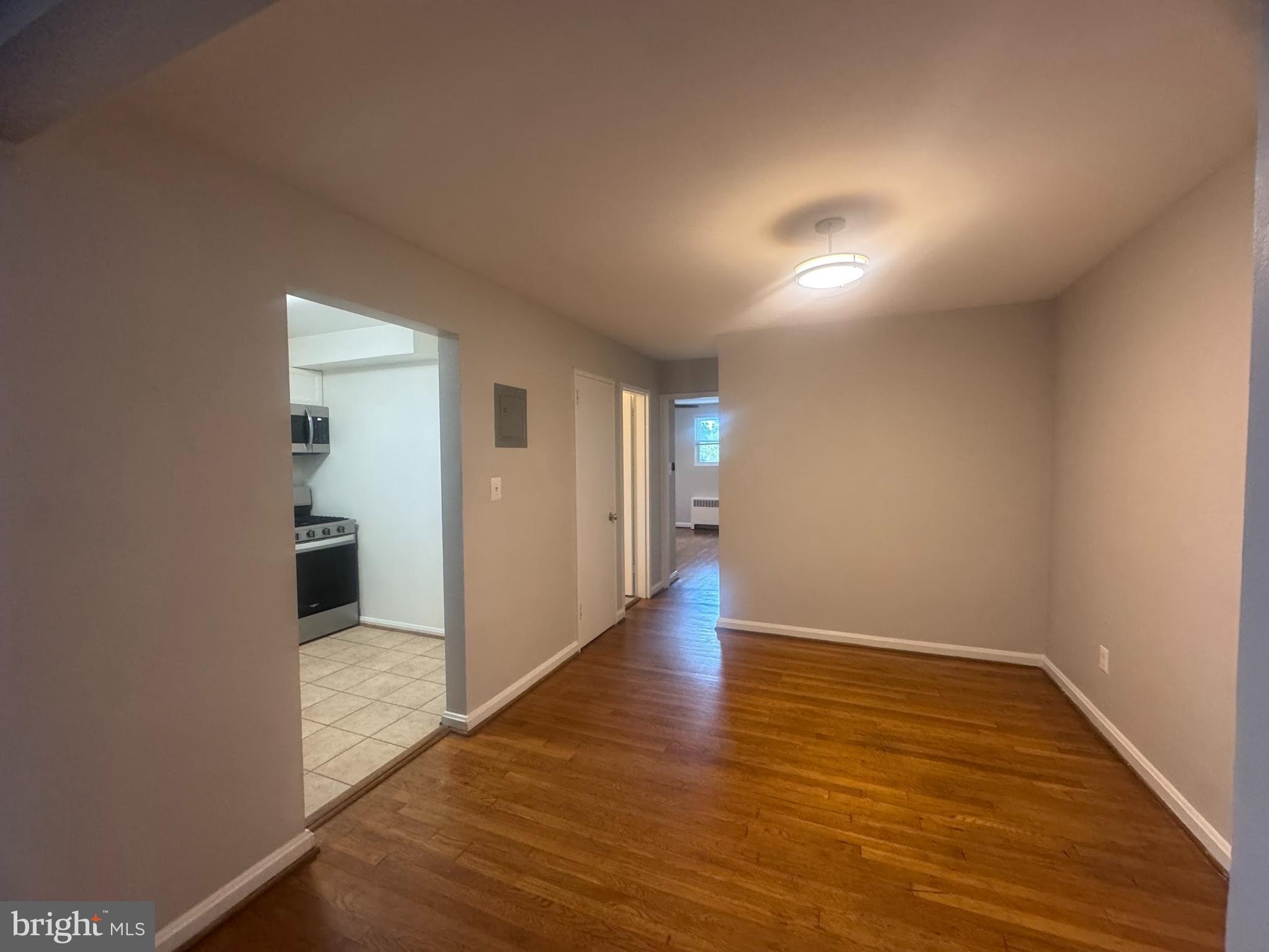 500 South Courthouse Road, Unit 9 Arlington, VA 22204 - Photo 6 of 18 a view of a hallway with wooden floor