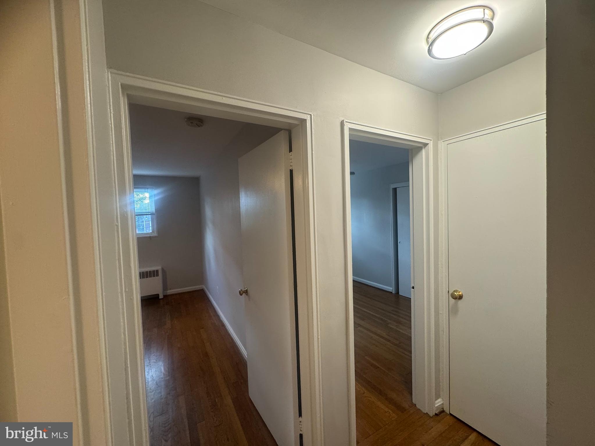 500 South Courthouse Road, Unit 9 Arlington, VA 22204 - Photo 10 of 18 a view of a hallway with wooden floor