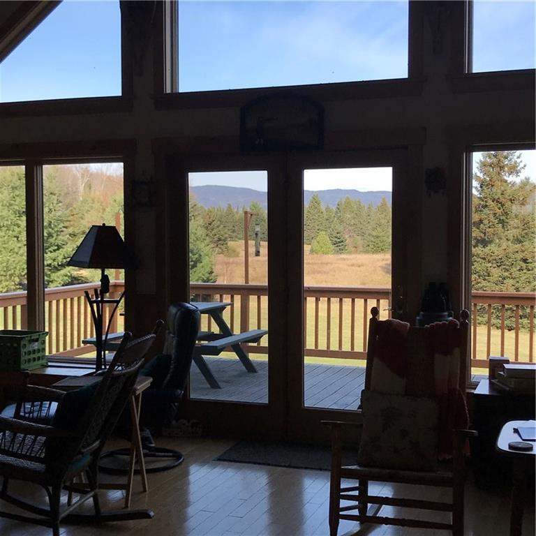 11 Booker Road Rangeley, ME 04970 - Photo 8 of 33 Mountain views from living/family room.