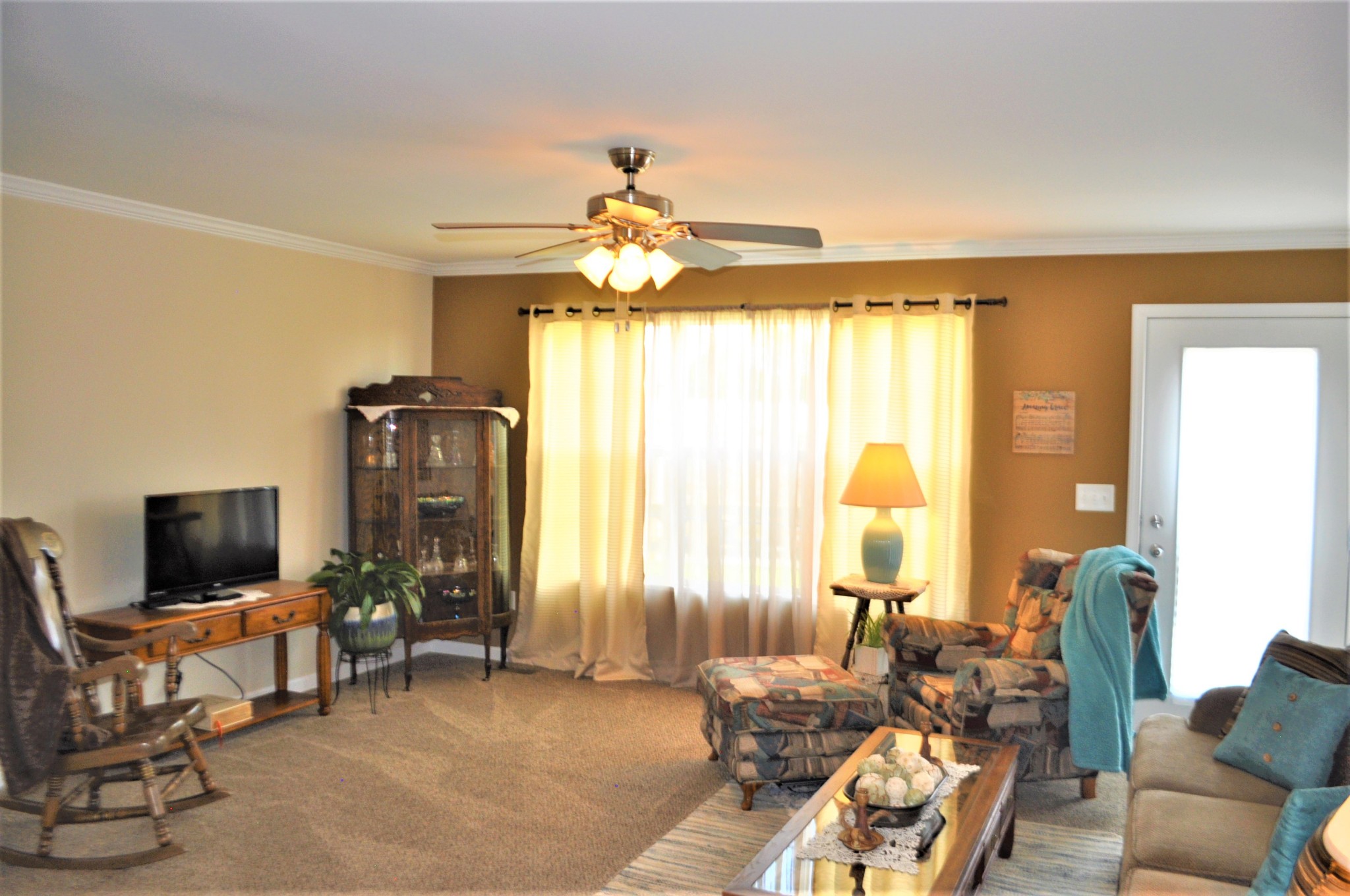 1134 Wrights Mill Road Spring Hill, TN 37174 - Photo 12 of 26 a living room with furniture and a flat screen tv