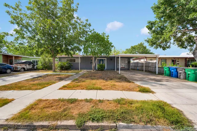 a view of house with outdoor space and street view