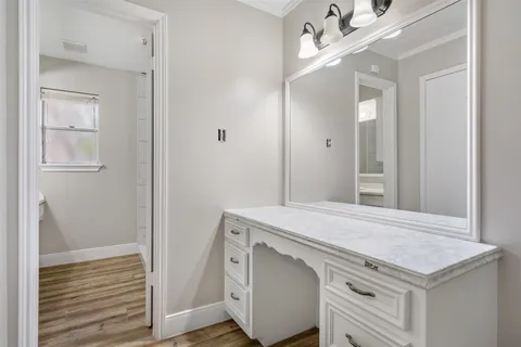 a bathroom with a sink double vanity and a mirror