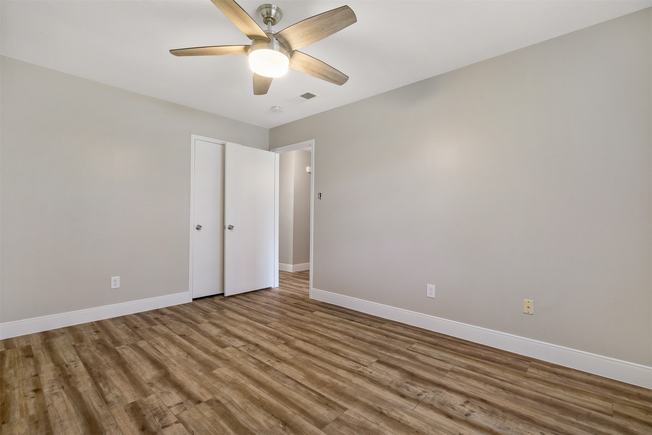 25519 Many Oak Drive Spring, TX 77380 - Photo 24 of 33 wooden floor in an empty room