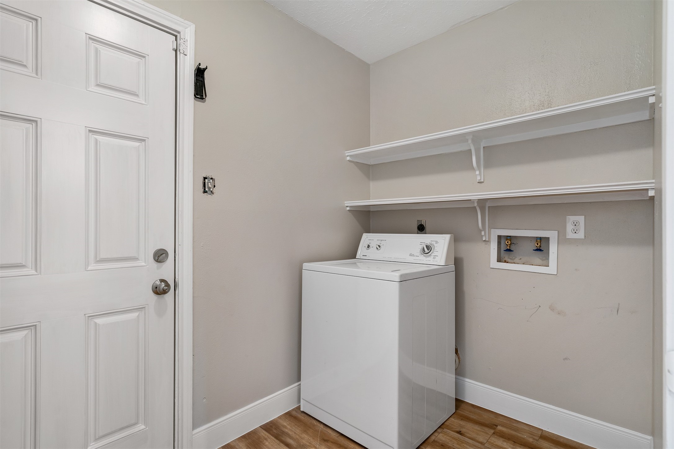 25519 Many Oak Drive Spring, TX 77380 - Photo 29 of 33 a utility room with dryer and washer