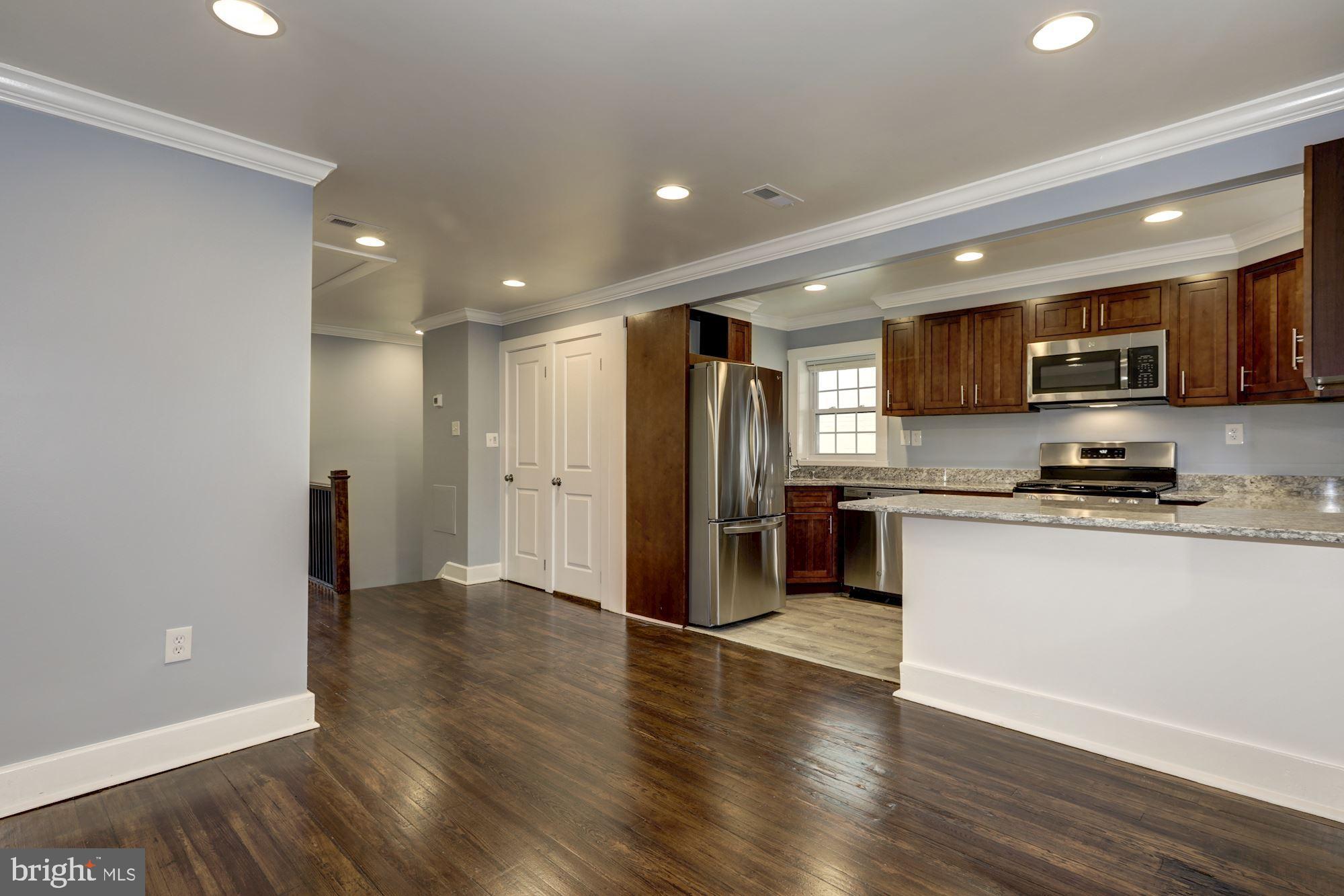 811 Thayer Avenue, Unit 2 Silver Spring, MD 20910 - Photo 2 of 30 Living Room Kitchen