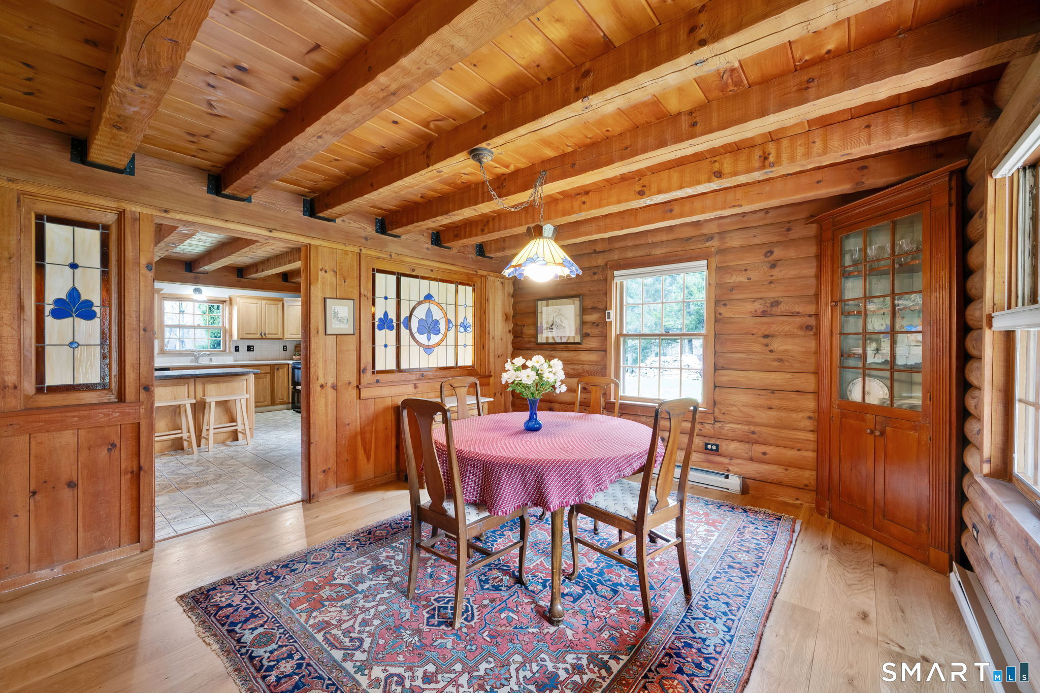 260 West Street Hebron, CT 06248 - Photo 13 of 40 a dining room with furniture and wooden floor
