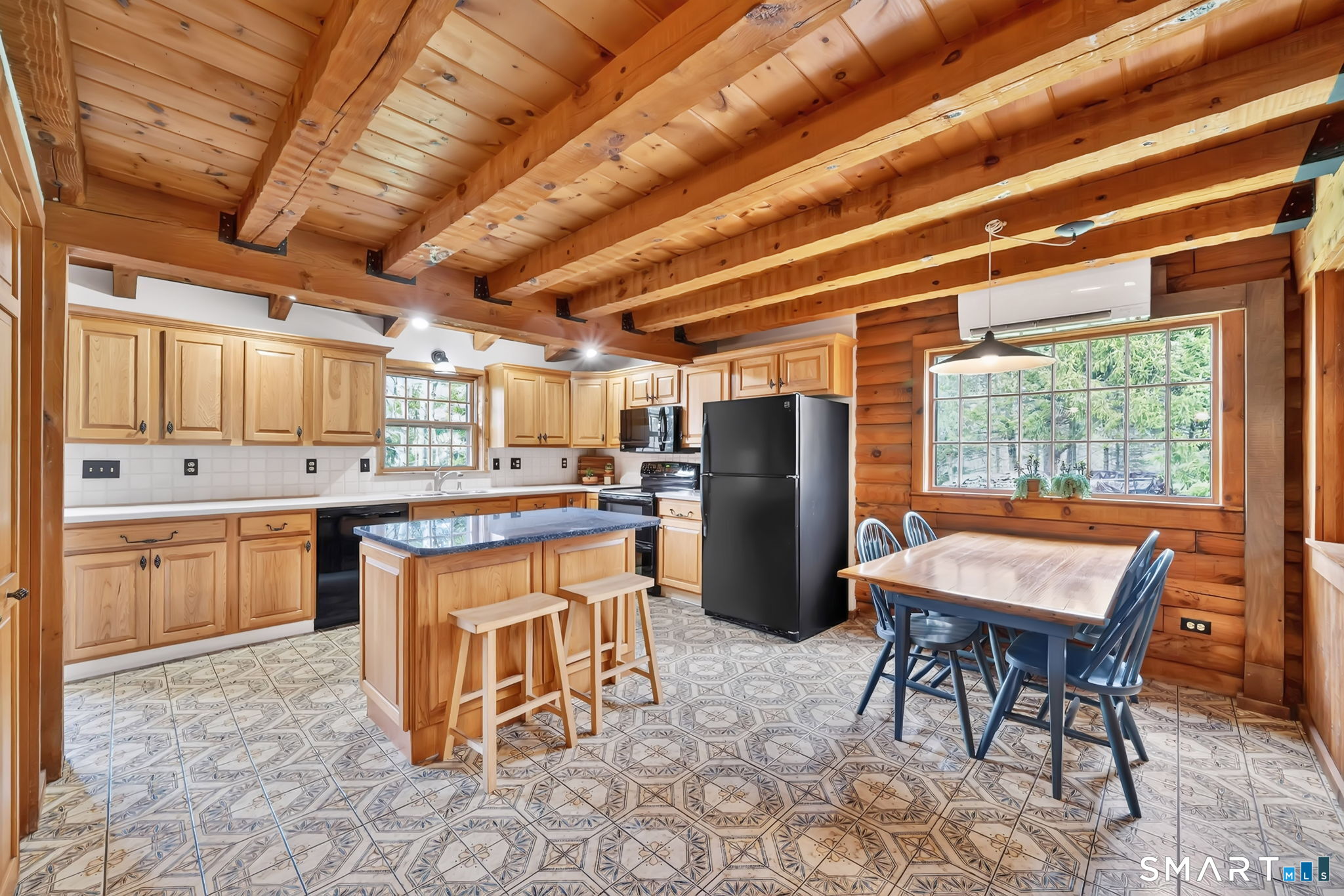 260 West Street Hebron, CT 06248 - Photo 15 of 40 a room with stainless steel appliances kitchen island granite countertop furniture and a sink