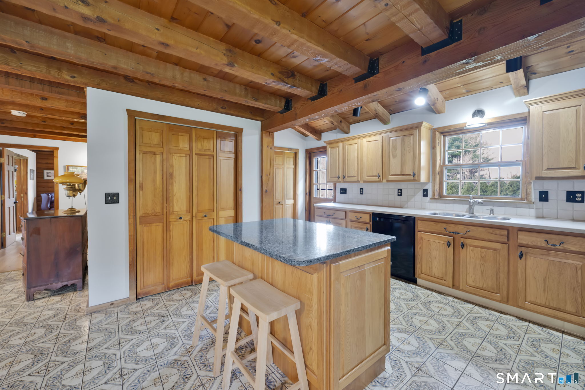 260 West Street Hebron, CT 06248 - Photo 16 of 40 a kitchen with stainless steel appliances granite countertop a sink window and cabinets