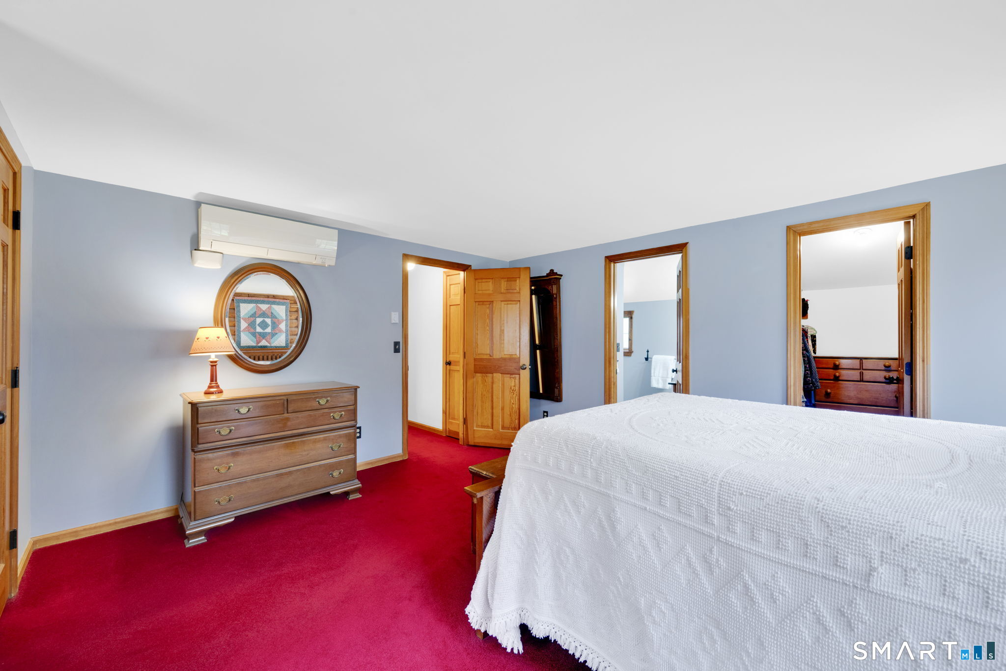 260 West Street Hebron, CT 06248 - Photo 21 of 40 a bedroom with a bed and a window